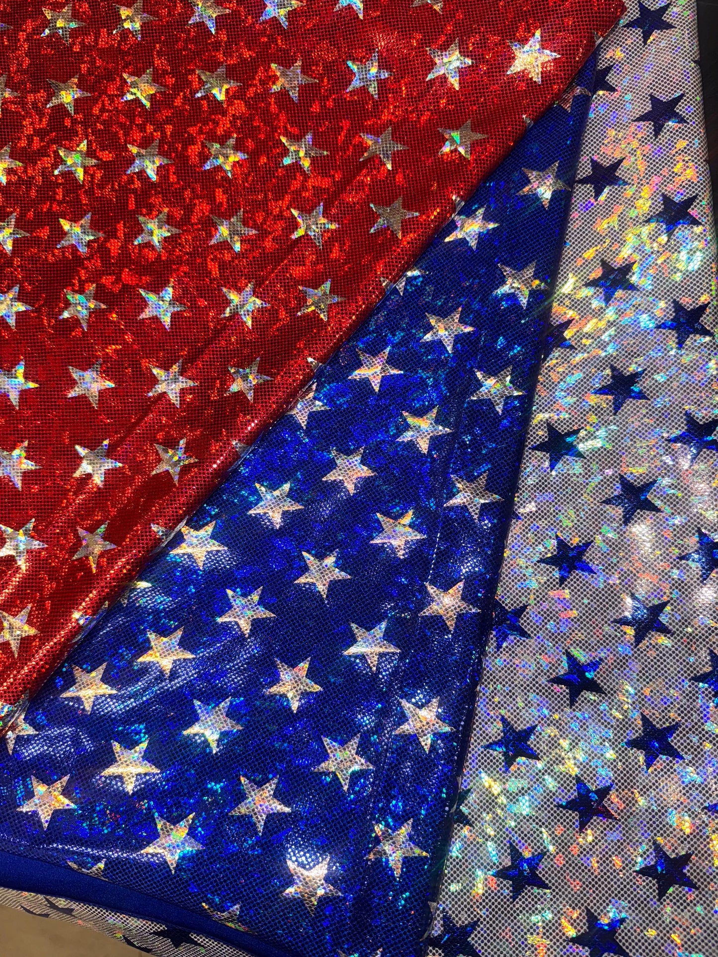 New Starlight pattern design on shattered glass holograma metallic nylon spandex 4way stretch 58/60”Sold by the YD.from Los Angeles CA USA.
