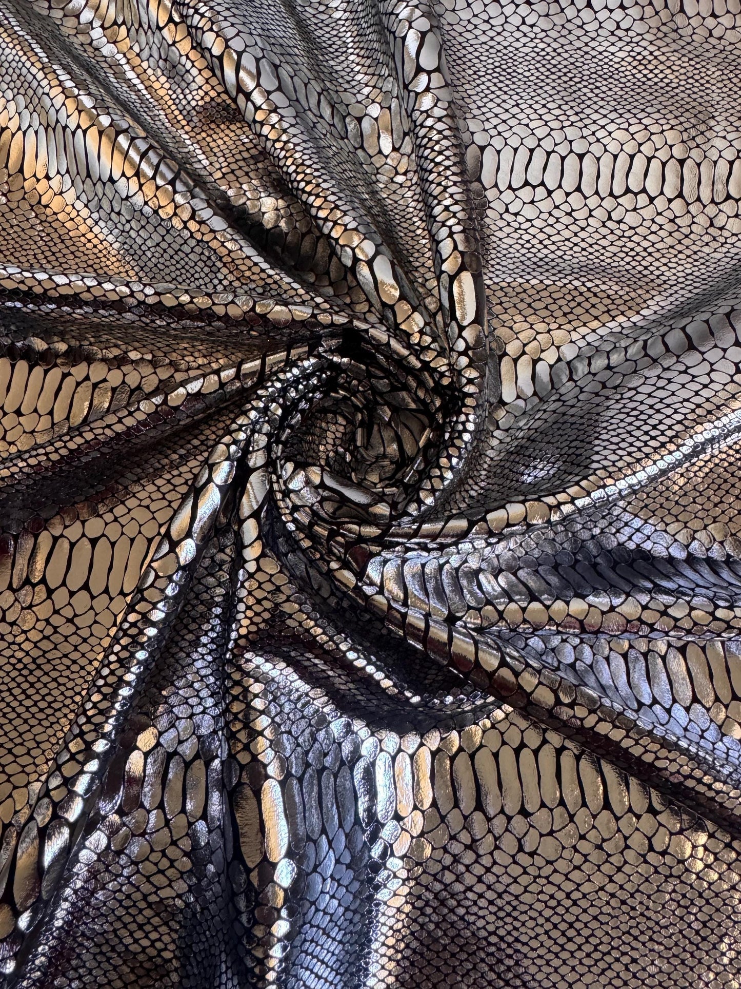 New skin snake designs on metallic stretch velvet poly spandex 4way stretch 58/60” by the YD.Ships worldwide from Los Angeles CA.