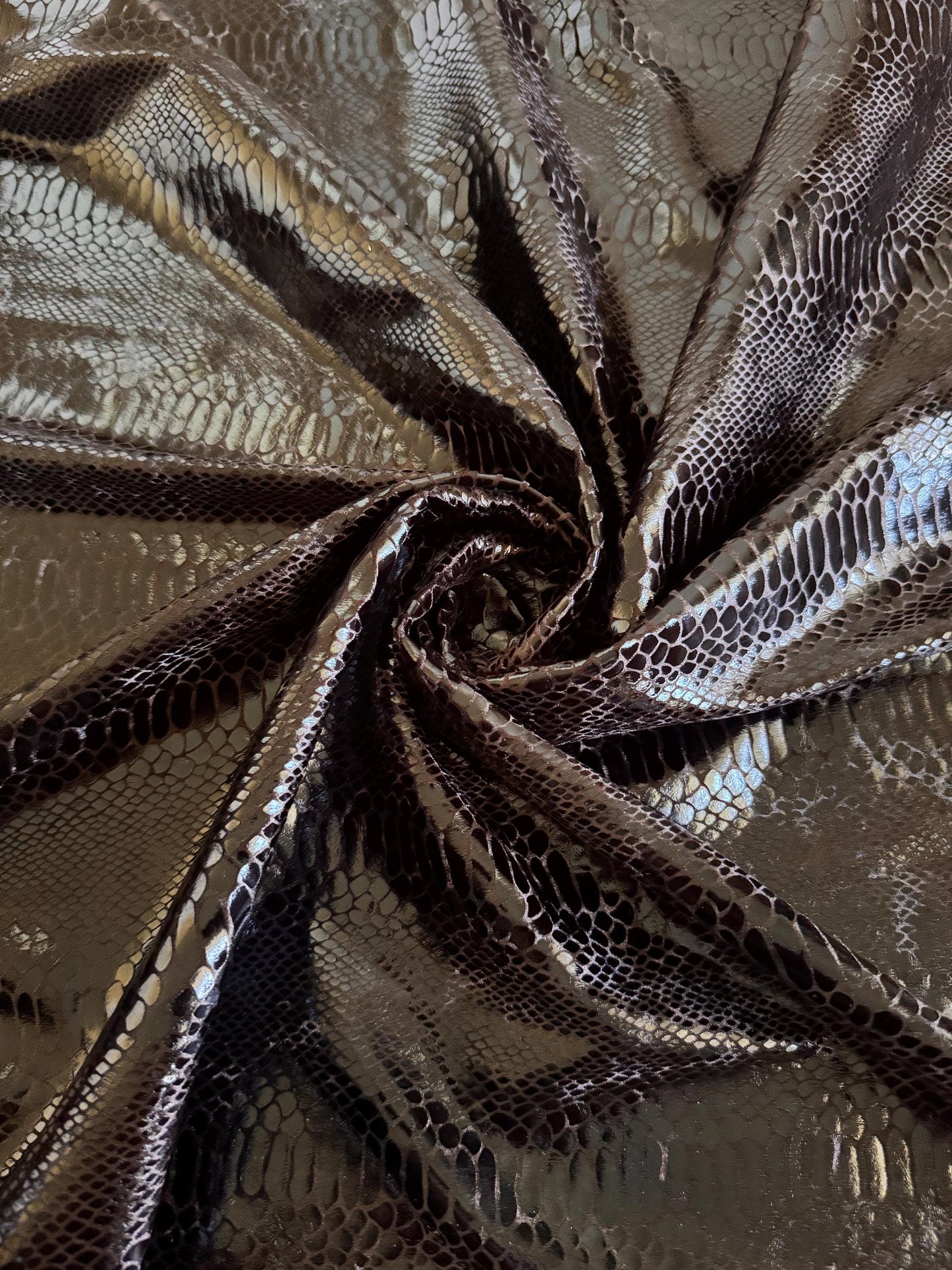 New skin snake designs on metallic stretch velvet poly spandex 4way stretch 58/60” by the YD.Ships worldwide from Los Angeles CA.