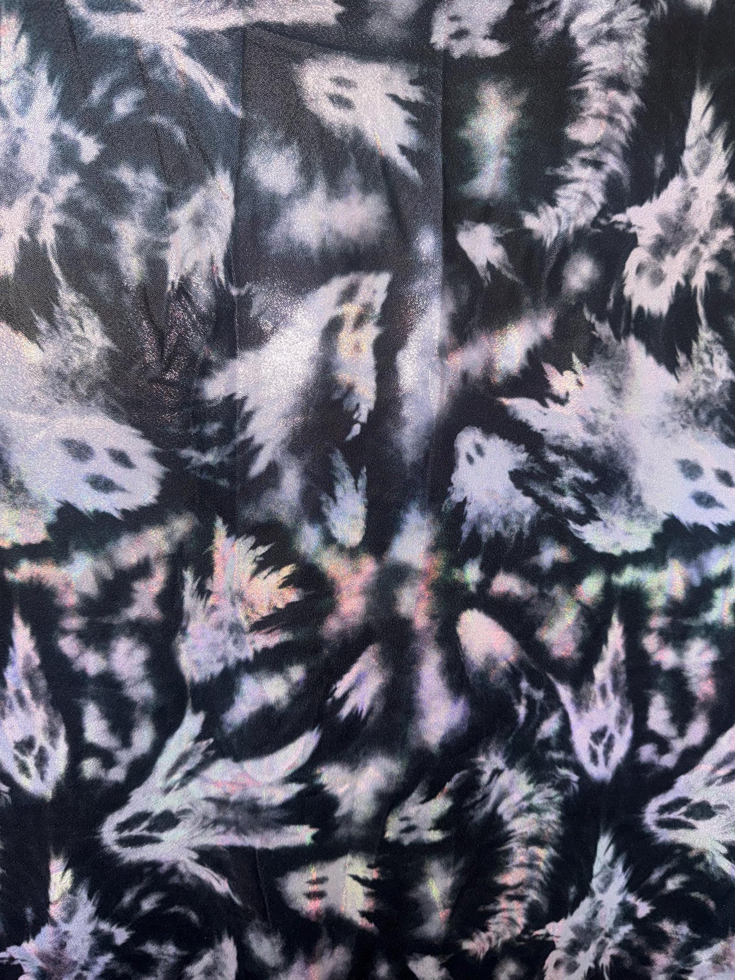 New Ghost Midnight design iridescent metallic with foggy foil nylon spandex 4-stretch 58/60”sold by the YD.ships worldwide from Los Angeles