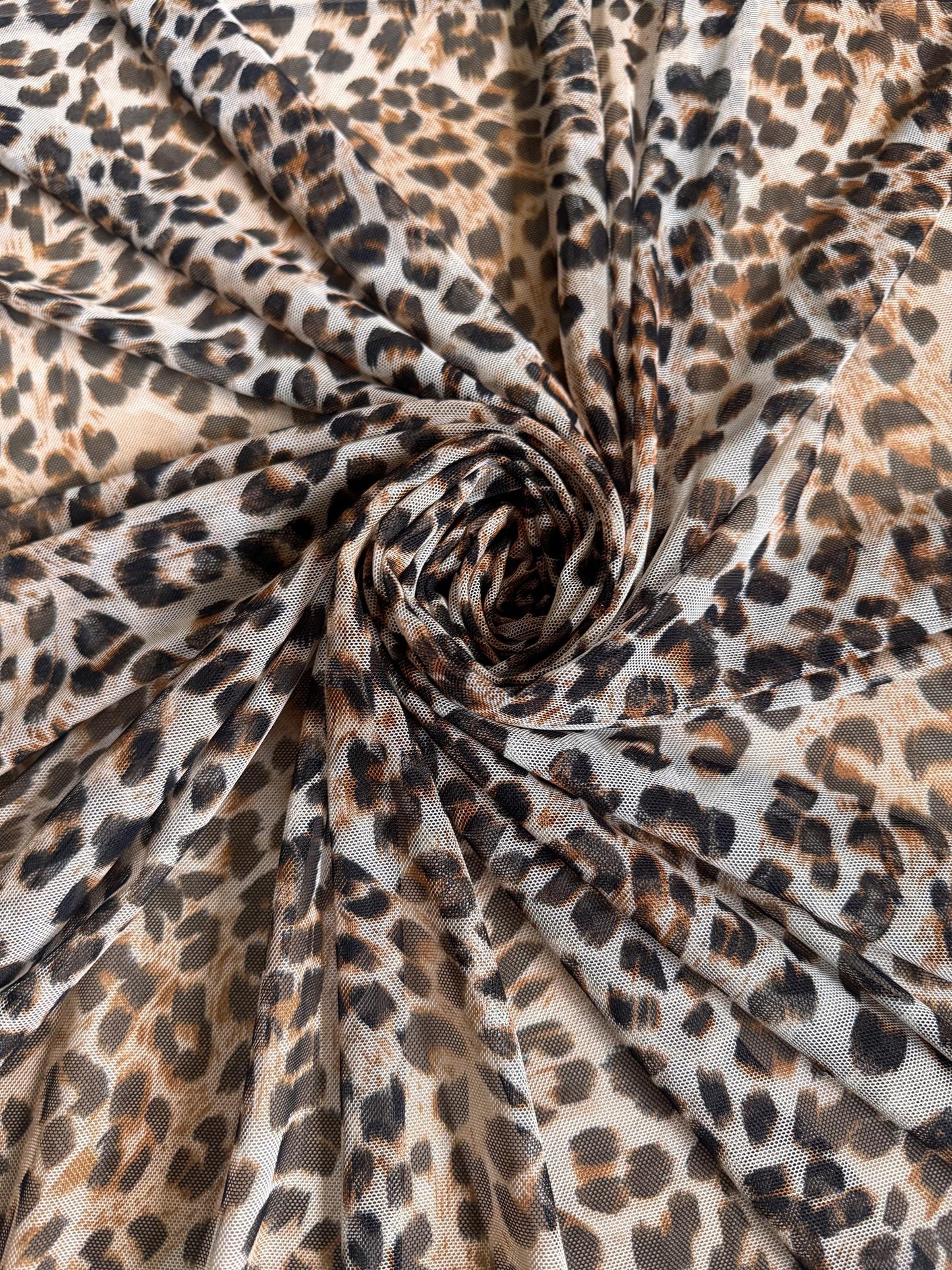 New cheetah pattern design power mesh nylon spandex 4-way stretch 58/60”sold by the YD. ships worldwide from Los Angeles California USA