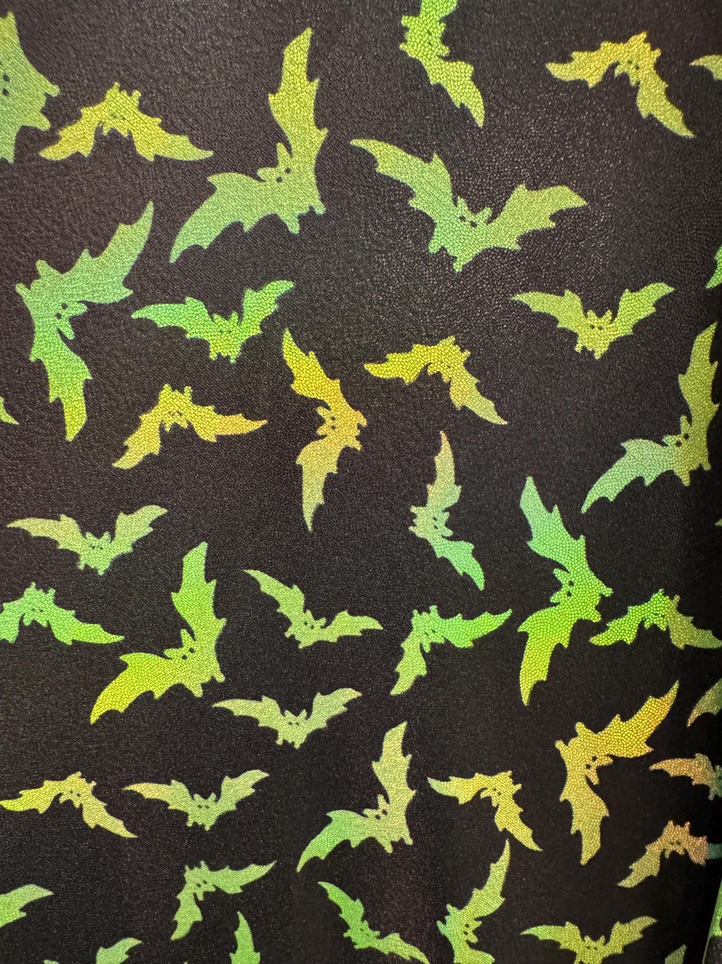 New bats pattern design on lacer hologram metallic nylon spandex 4-way stretch 58/60”sold by the YD.Ships worldwide from Los Angeles Ca