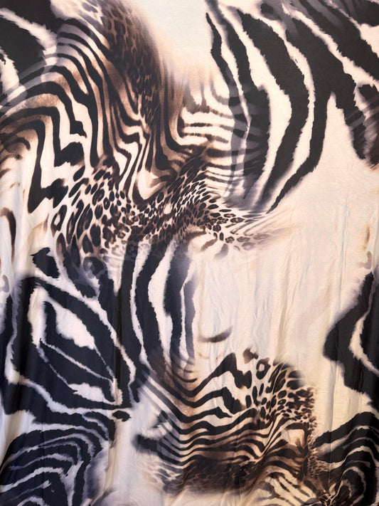 Abstract Mix Animal Skin design print on poly spandex 4-way stretch 58/60”sold by the YD. ships Worldwide from Los Angeles California USA