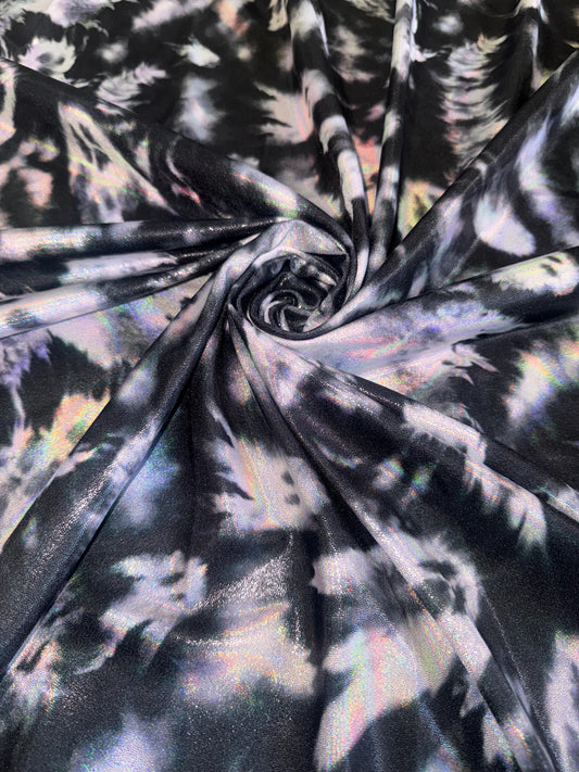 New Ghost Midnight design iridescent metallic with foggy foil nylon spandex 4-stretch 58/60”sold by the YD.ships worldwide from Los Angeles