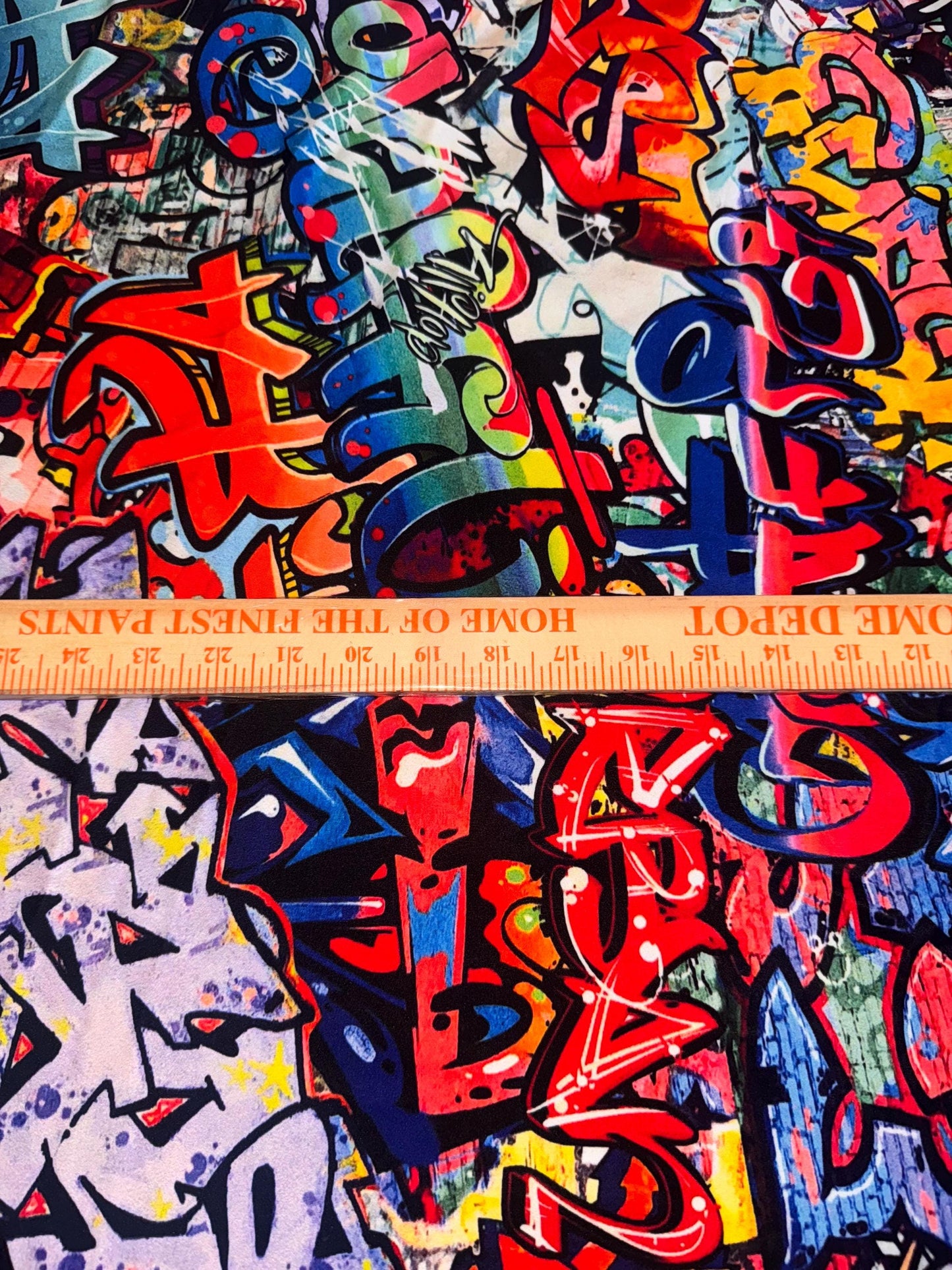 New streetstyle graffiti design print on nylon spandex 4-way stretch 58/60”sold by the YD.ships worldwide from Los Angeles California USA.