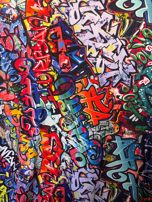 New streetstyle graffiti design print on nylon spandex 4-way stretch 58/60”sold by the YD.ships worldwide from Los Angeles California USA.