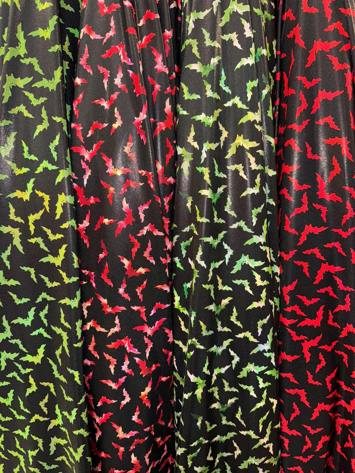 New bats pattern design on lacer hologram metallic nylon spandex 4-way stretch 58/60”sold by the YD.Ships worldwide from Los Angeles Ca