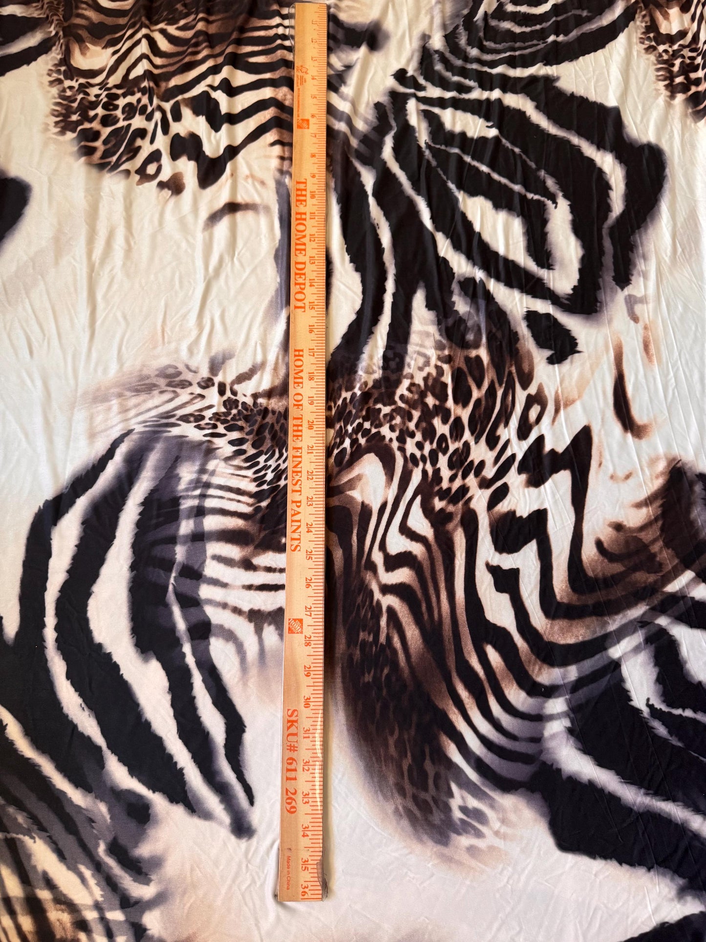 Abstract Mix Animal Skin design print on poly spandex 4-way stretch 58/60”sold by the YD. ships Worldwide from Los Angeles California USA