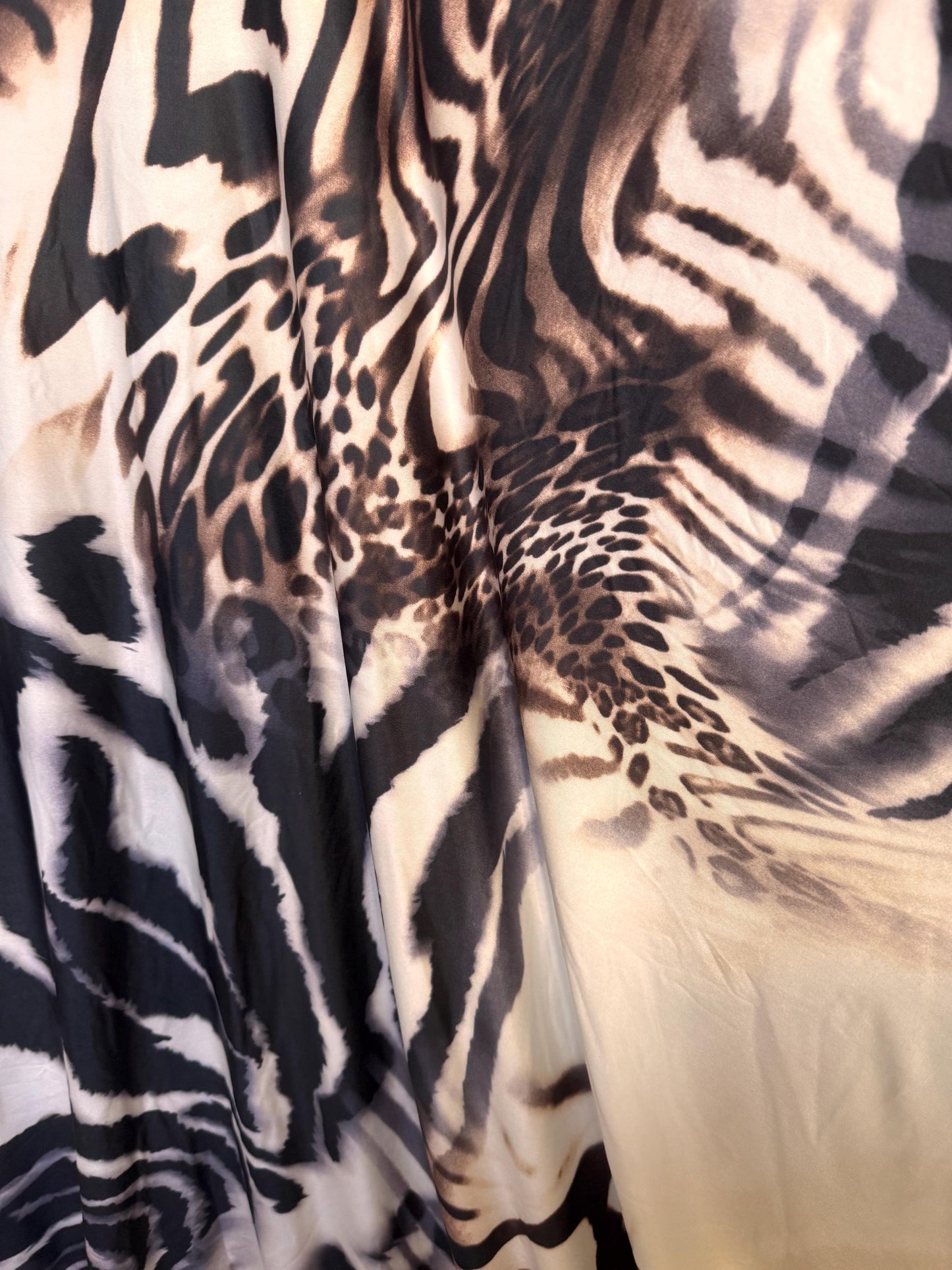 Abstract Mix Animal Skin design print on poly spandex 4-way stretch 58/60”sold by the YD. ships Worldwide from Los Angeles California USA