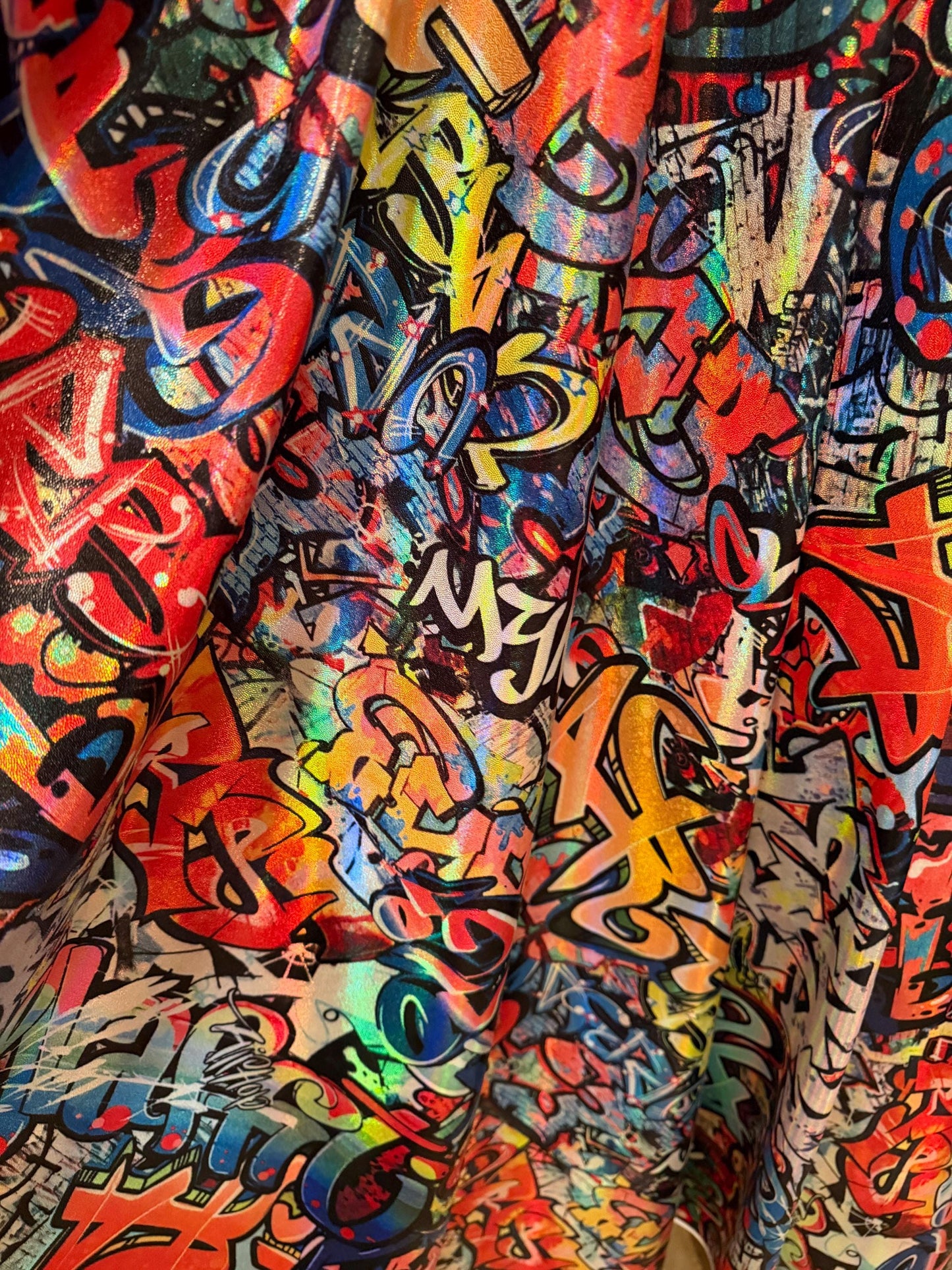 New Graffiti Art design  lacer hologram metallic nylon spandex 4-way stretch 58/60”sold by the YD.Ships worldwide from Los Angeles Ca.