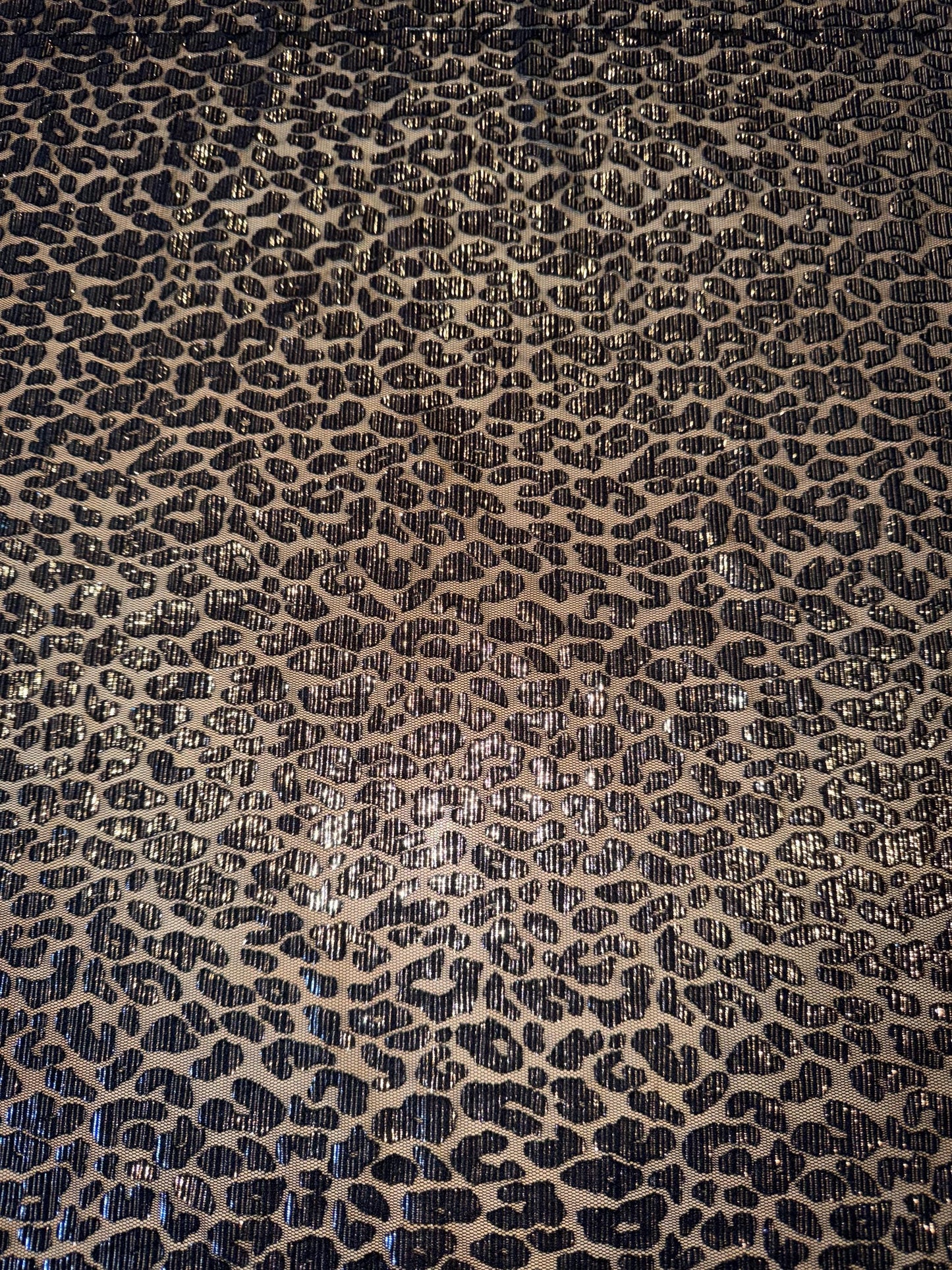New cheetah pattern design on metallic mesh 2-way stretch 58/60”Sold by the YD.Ships worldwide from LA.