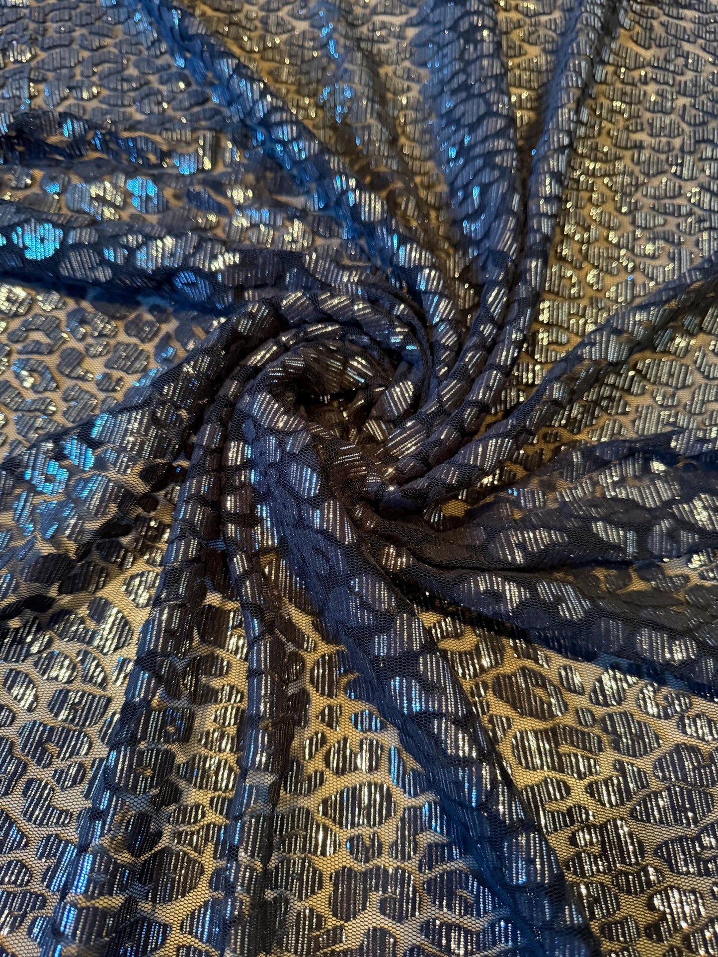 New cheetah pattern design on metallic mesh 2-way stretch 58/60”Sold by the YD.Ships worldwide from LA.