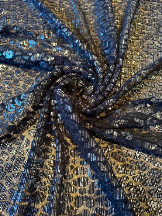New cheetah pattern design on metallic mesh 2-way stretch 58/60”Sold by the YD.Ships worldwide from LA.
