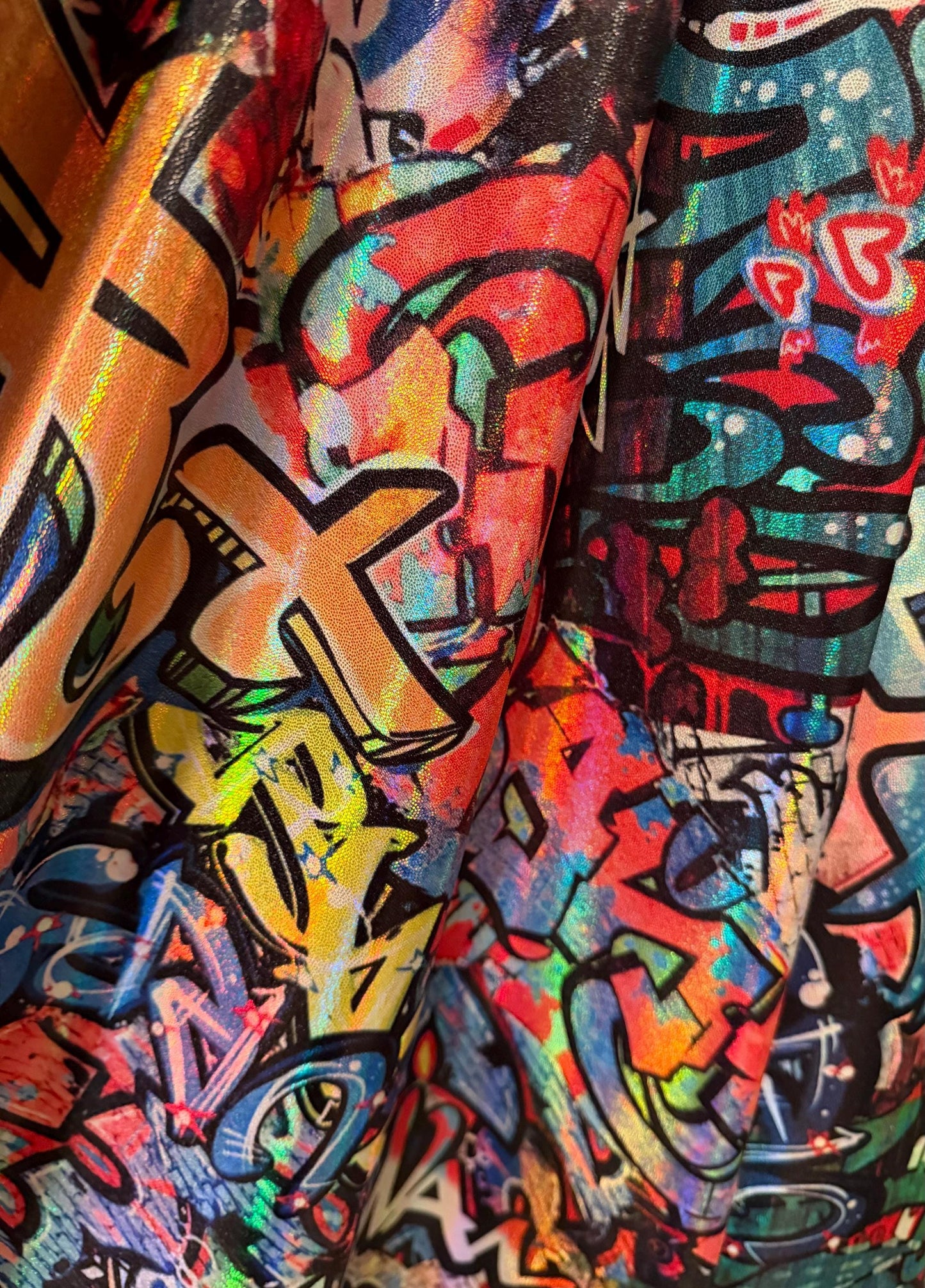 New Graffiti Art design  lacer hologram metallic nylon spandex 4-way stretch 58/60”sold by the YD.Ships worldwide from Los Angeles Ca.