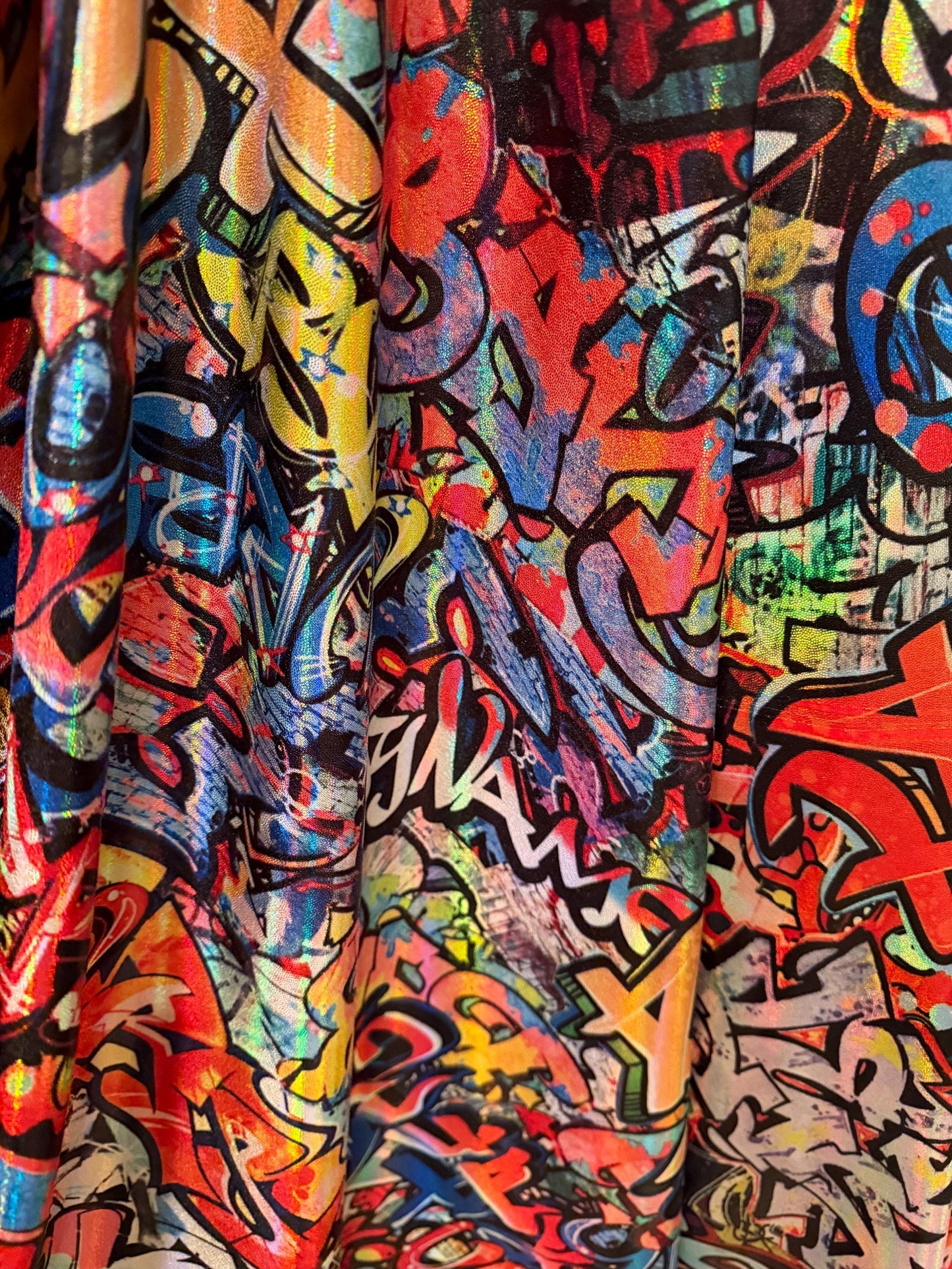 New Graffiti Art design  lacer hologram metallic nylon spandex 4-way stretch 58/60”sold by the YD.Ships worldwide from Los Angeles Ca.