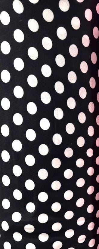 Polka dots pattern design print on poly spandex 4-way stretch 58/60”Sold by the YD. Ships worldwide from Los Angeles California USA