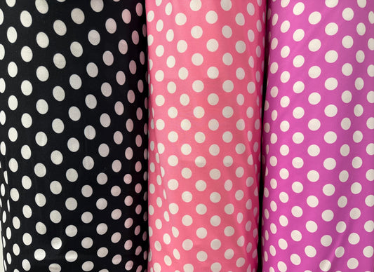 Polka dots pattern design print on poly spandex 4-way stretch 58/60”Sold by the YD. Ships worldwide from Los Angeles California USA