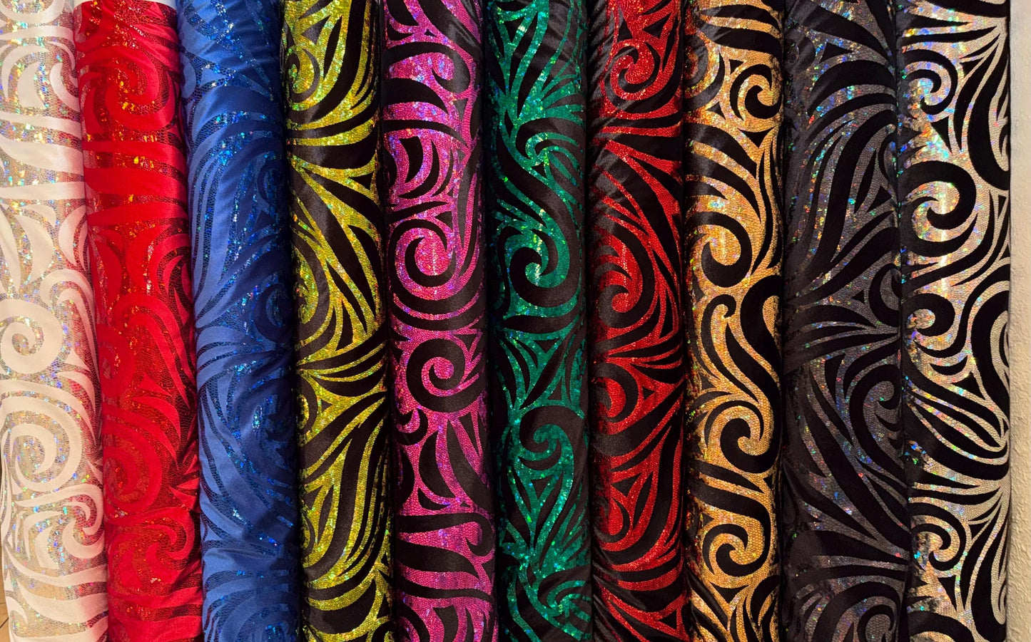 New luxury swirl hologram metallic design on stretch velvet 4-way stretch 58/60”sold by the YD. Ships worldwide from Los Angeles California