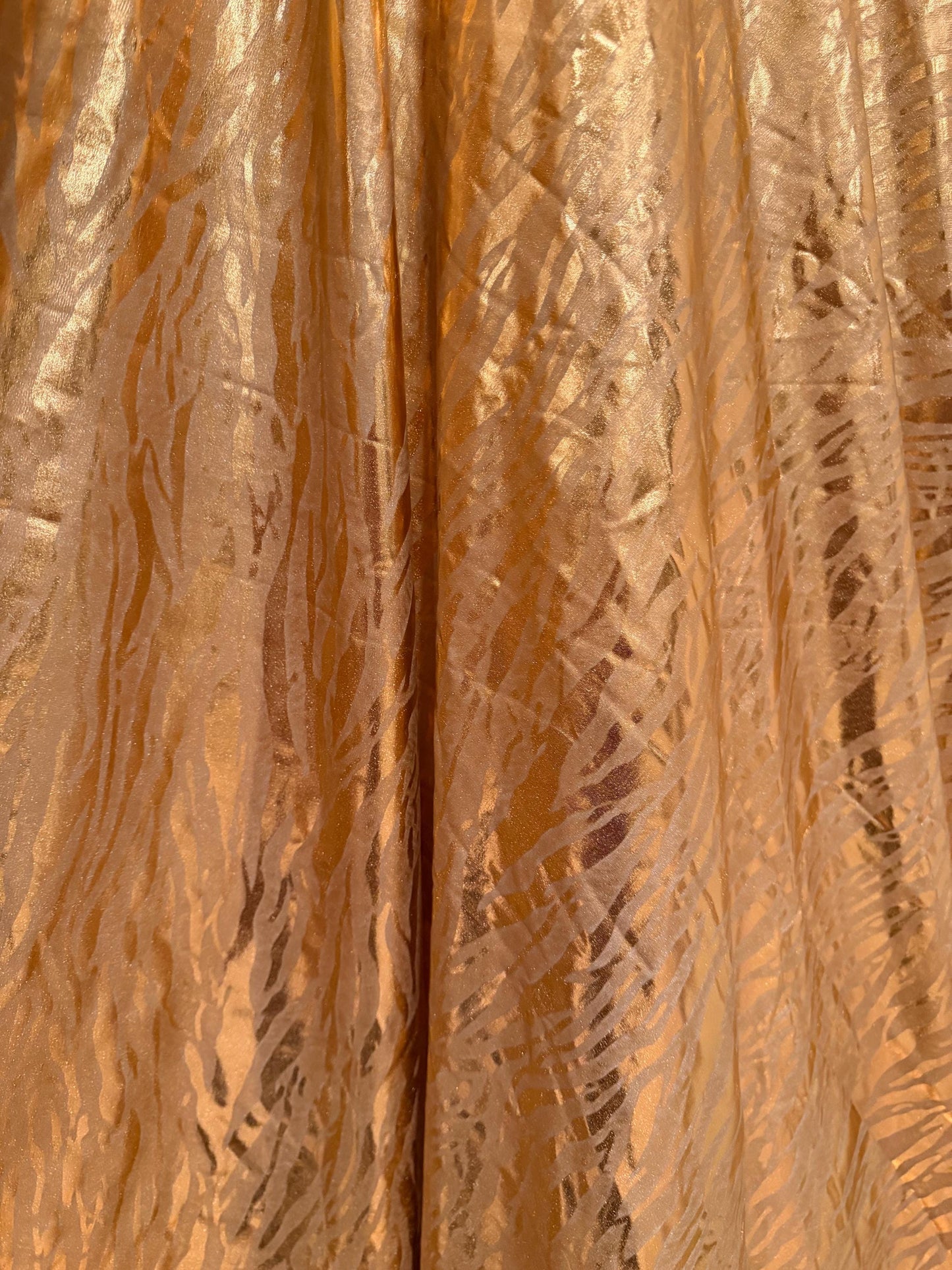 New Gold Metallic zebra design design print on nylon spandex 4-way stretch 58/60”sold by the YD.Ships worldwide from Los Angeles CA