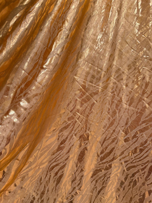 New Gold Metallic zebra design design print on nylon spandex 4-way stretch 58/60”sold by the YD.Ships worldwide from Los Angeles CA