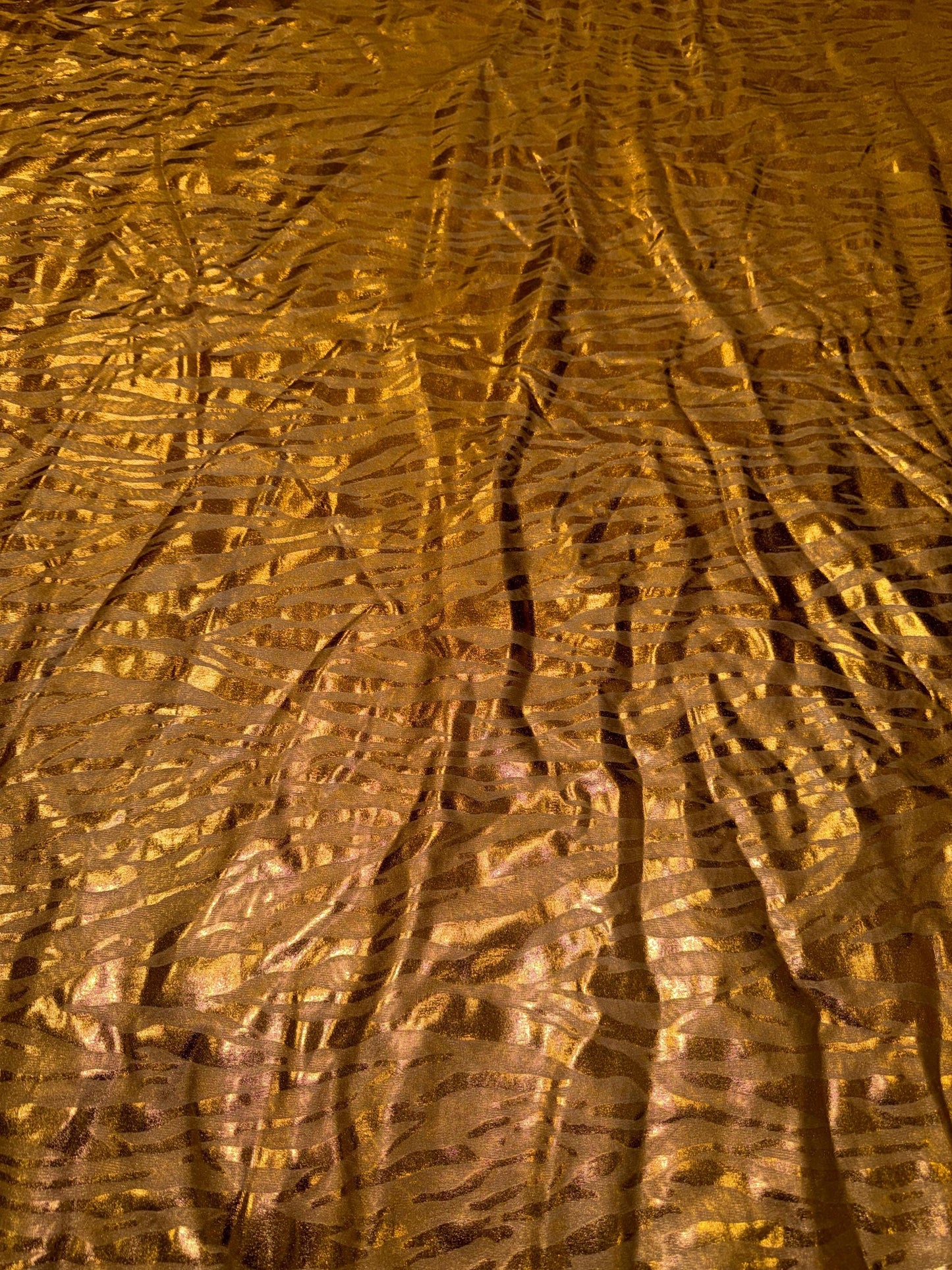 New Gold Metallic zebra design design print on nylon spandex 4-way stretch 58/60”sold by the YD.Ships worldwide from Los Angeles CA