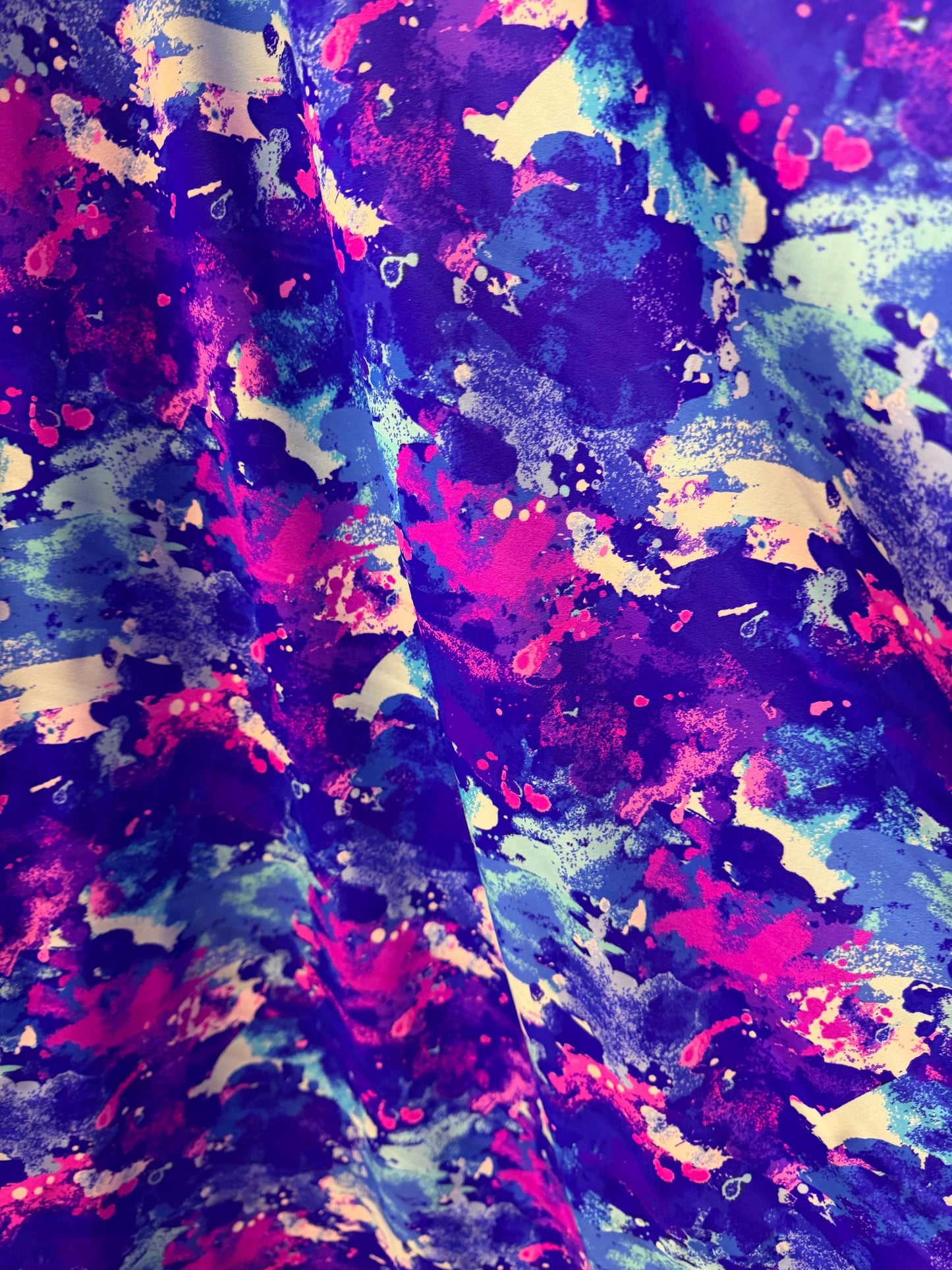 New splatter paint design print on nylon spandex 58/60”sold by the YD. Ships worldwide from Los Angeles California USA.