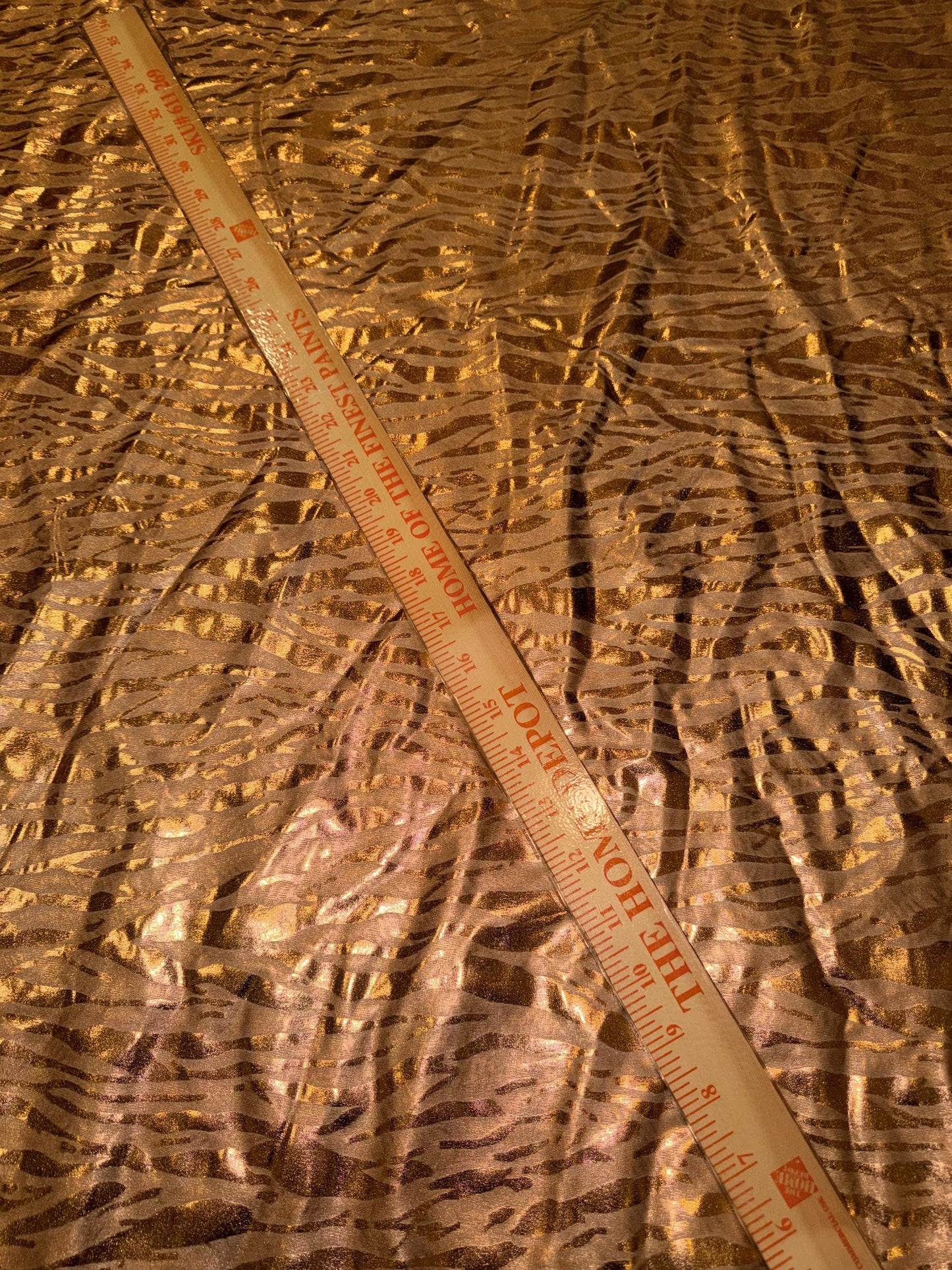 New Gold Metallic zebra design design print on nylon spandex 4-way stretch 58/60”sold by the YD.Ships worldwide from Los Angeles CA