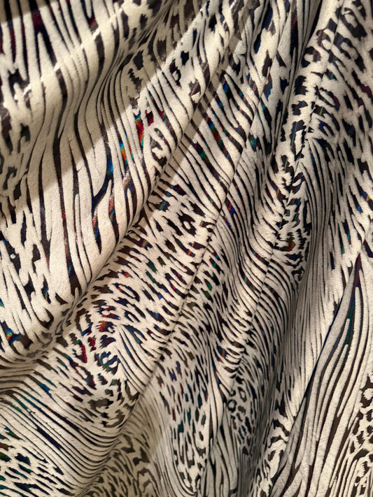 New abstract animal design on metallic hologram nylon spandex4-way stretch 58/60”sold by the YD. ships Worldwide from Los Angeles CA