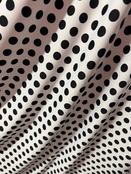 NEW Polka dots white/black design print on best quality of nylon spandex 4-way stretch 58/60”sold by the YD. ships Worldwide from LA.