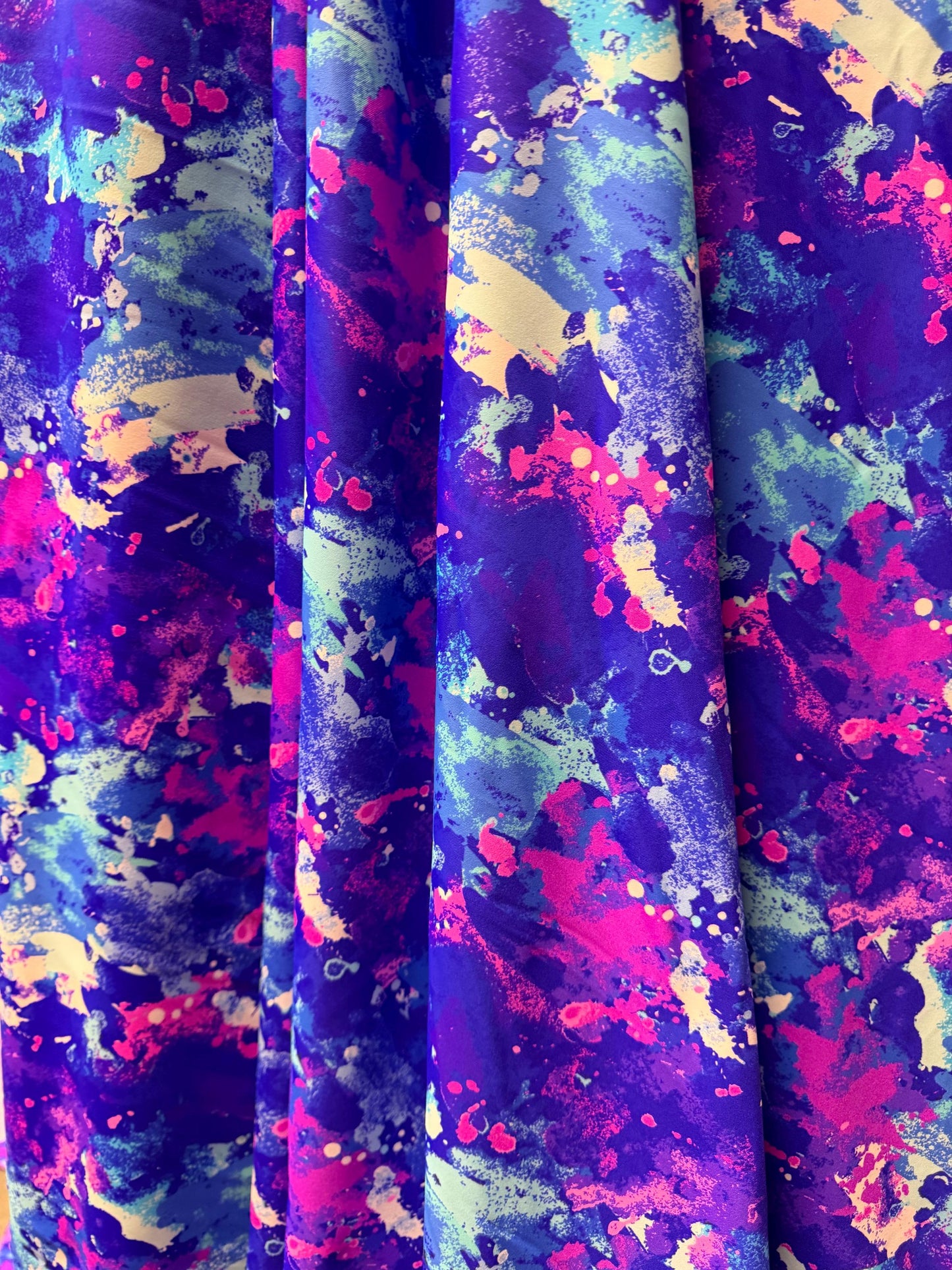 New splatter paint design print on nylon spandex 58/60”sold by the YD. Ships worldwide from Los Angeles California USA.