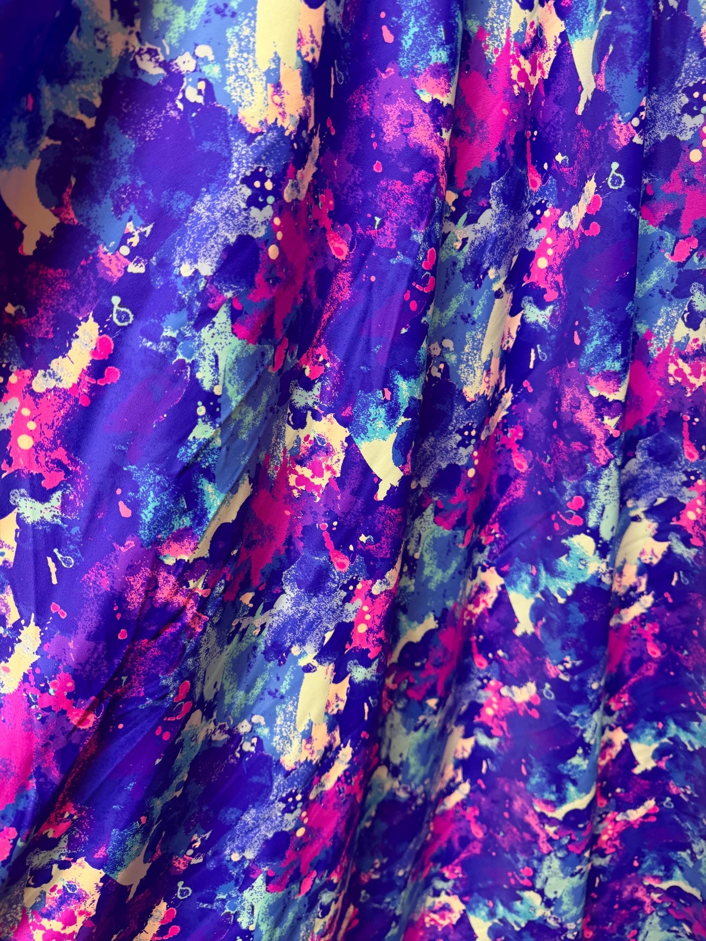 New splatter paint design print on nylon spandex 58/60”sold by the YD. Ships worldwide from Los Angeles California USA.