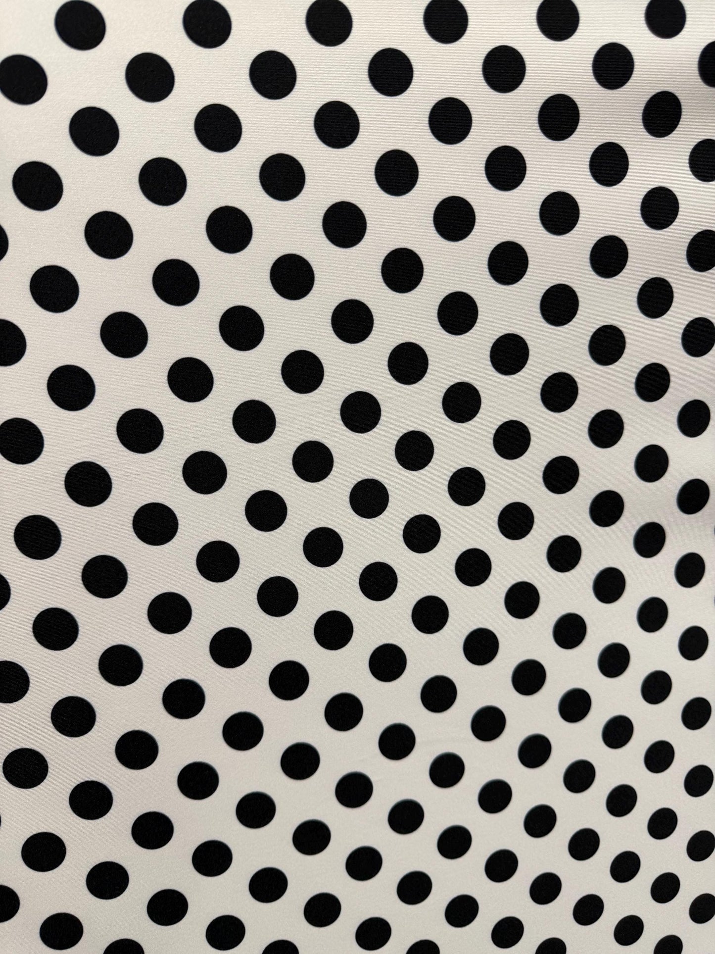 NEW Polka dots white/black design print on best quality of nylon spandex 4-way stretch 58/60”sold by the YD. ships Worldwide from LA.