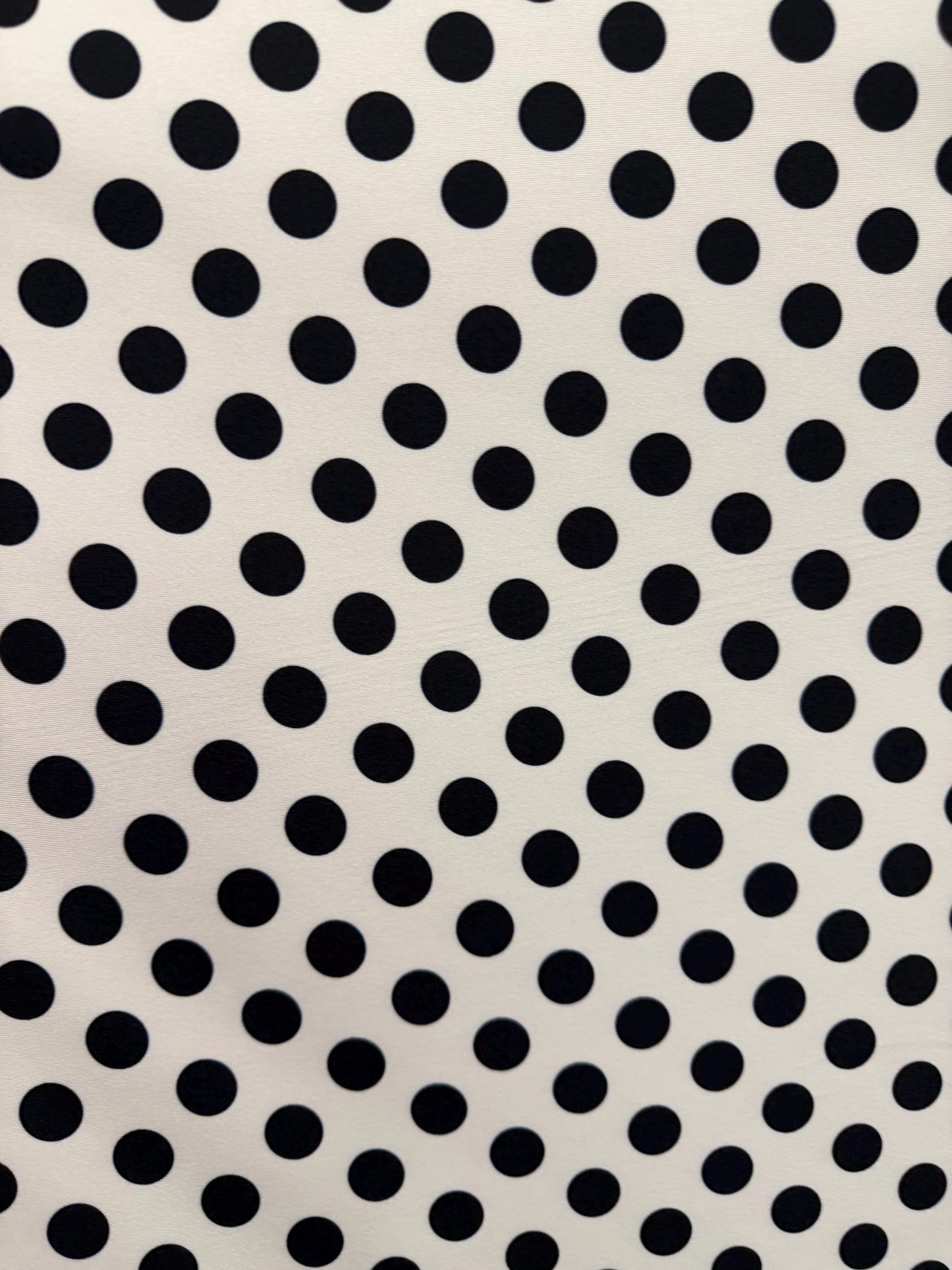 NEW Polka dots white/black design print on best quality of nylon spandex 4-way stretch 58/60”sold by the YD. ships Worldwide from LA.