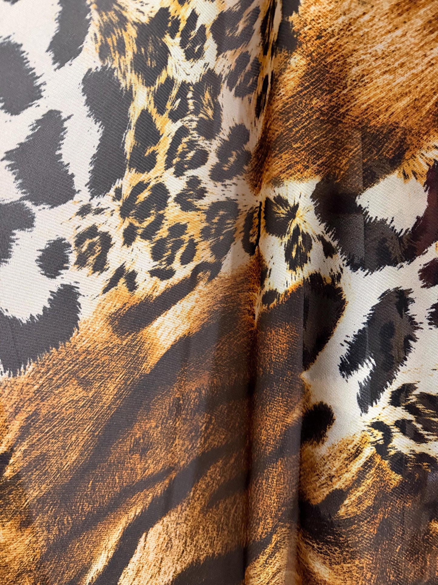 New abstract animal design print on power mesh 4-way stretch 58/60”sold by the YD. Ships worldwide from Los Angeles California USA.