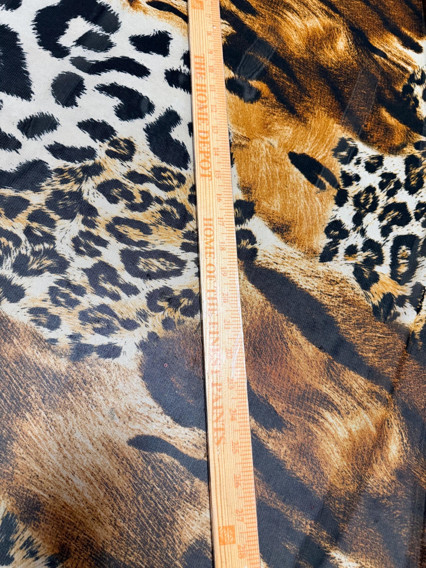 New abstract animal design print on power mesh 4-way stretch 58/60”sold by the YD. Ships worldwide from Los Angeles California USA.