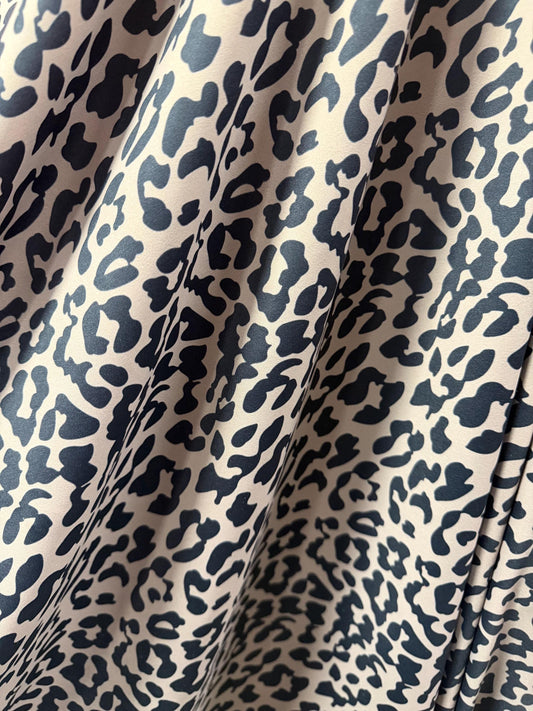 Cheetah Taupe/Black design print on the best quality nylon spandex 4-way stretch 58/60”sold by the YD.ships worldwide from Los Angeles CA