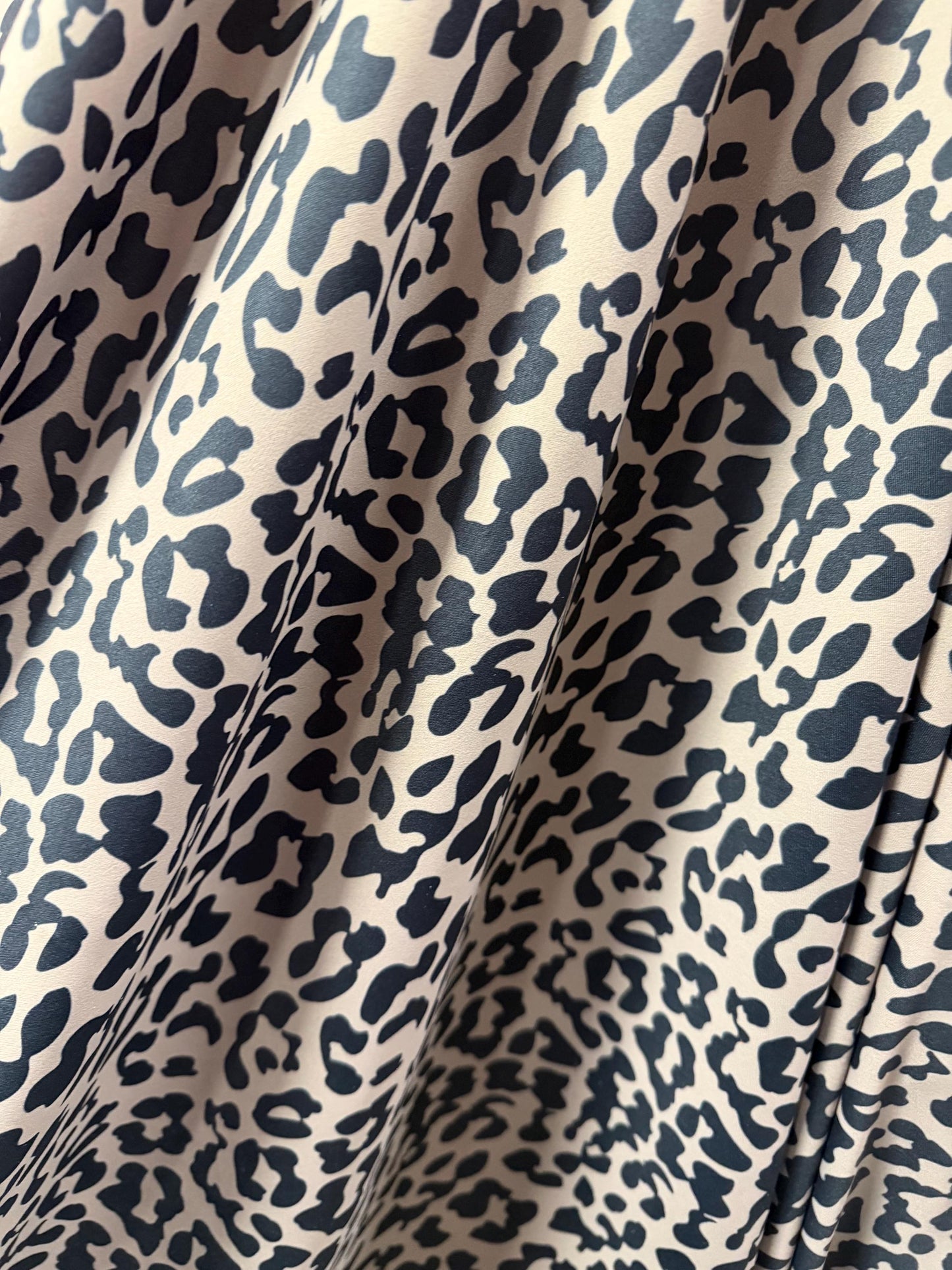 Cheetah Taupe/Black design print on the best quality nylon spandex 4-way stretch 58/60”sold by the YD.ships worldwide from Los Angeles CA