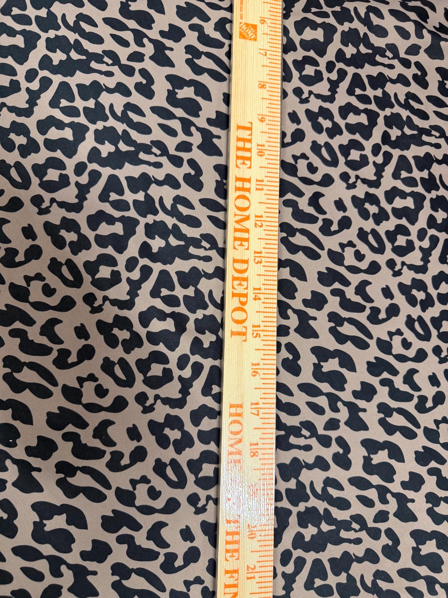 Cheetah Taupe/Black design print on the best quality nylon spandex 4-way stretch 58/60”sold by the YD.ships worldwide from Los Angeles CA