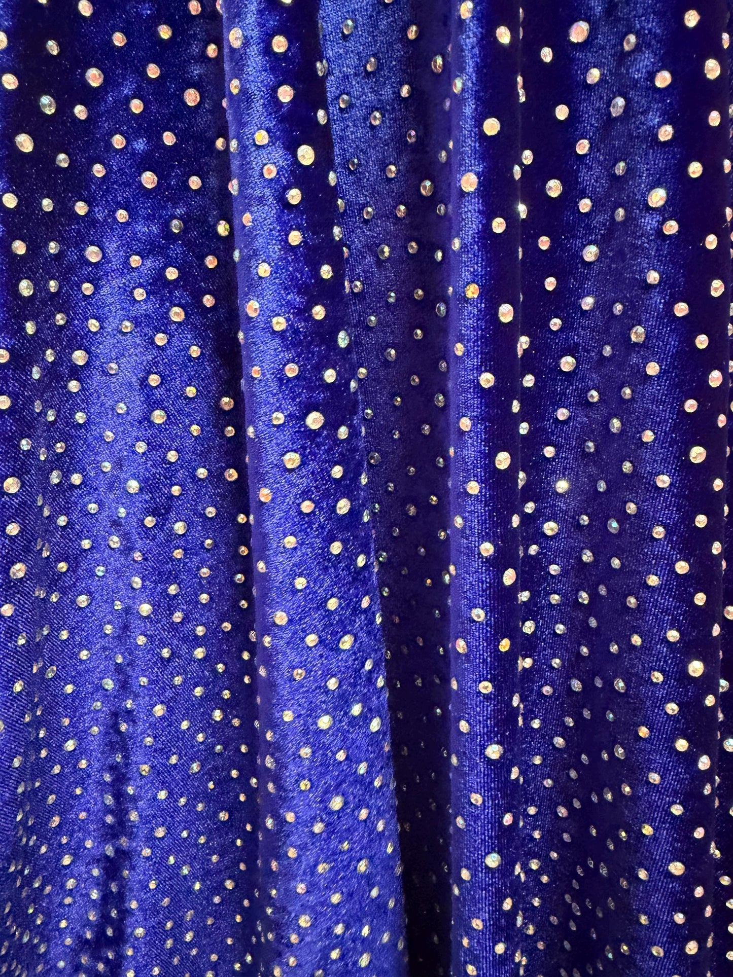 New Rhinestone on stretch velvet 4-way stretch 58/60”sold by the YD. ships Worldwide from Los Angeles CA USA.