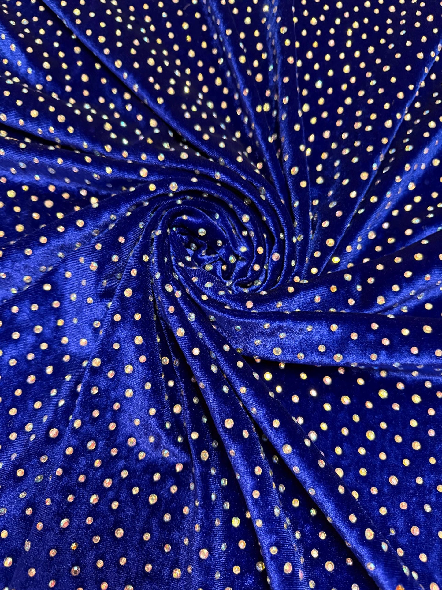 New Rhinestone on stretch velvet 4-way stretch 58/60”sold by the YD. ships Worldwide from Los Angeles CA USA.
