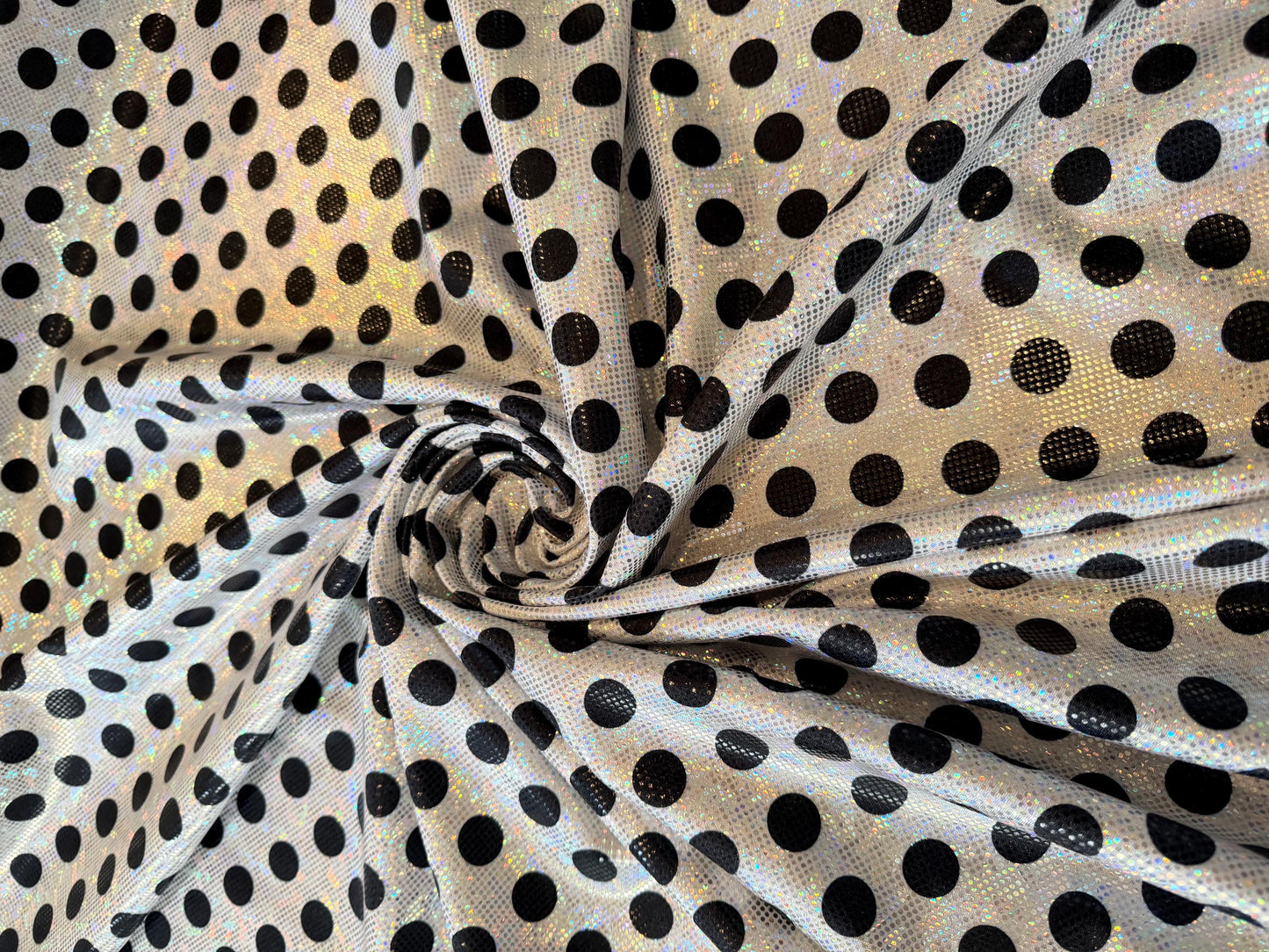 New polka dots pattern design print on shattered glass holograma metallic nylon spandex 4way stretch 58/60”Sold by the YD.