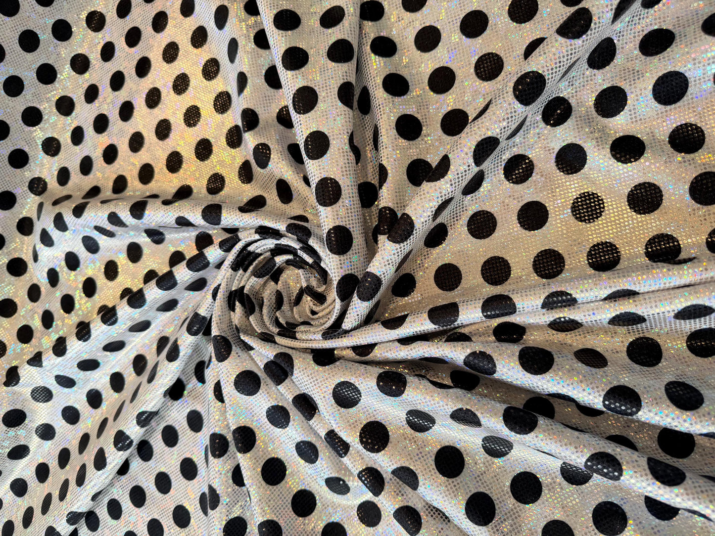 New polka dots pattern design print on shattered glass holograma metallic nylon spandex 4way stretch 58/60”Sold by the YD.
