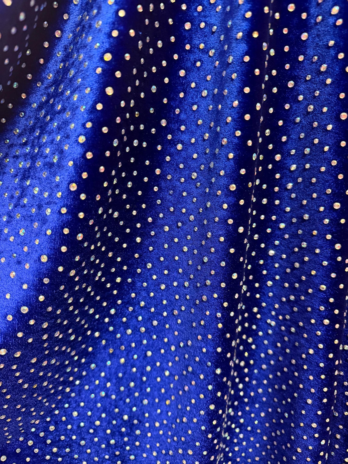 New Rhinestone on stretch velvet 4-way stretch 58/60”sold by the YD. ships Worldwide from Los Angeles CA USA.