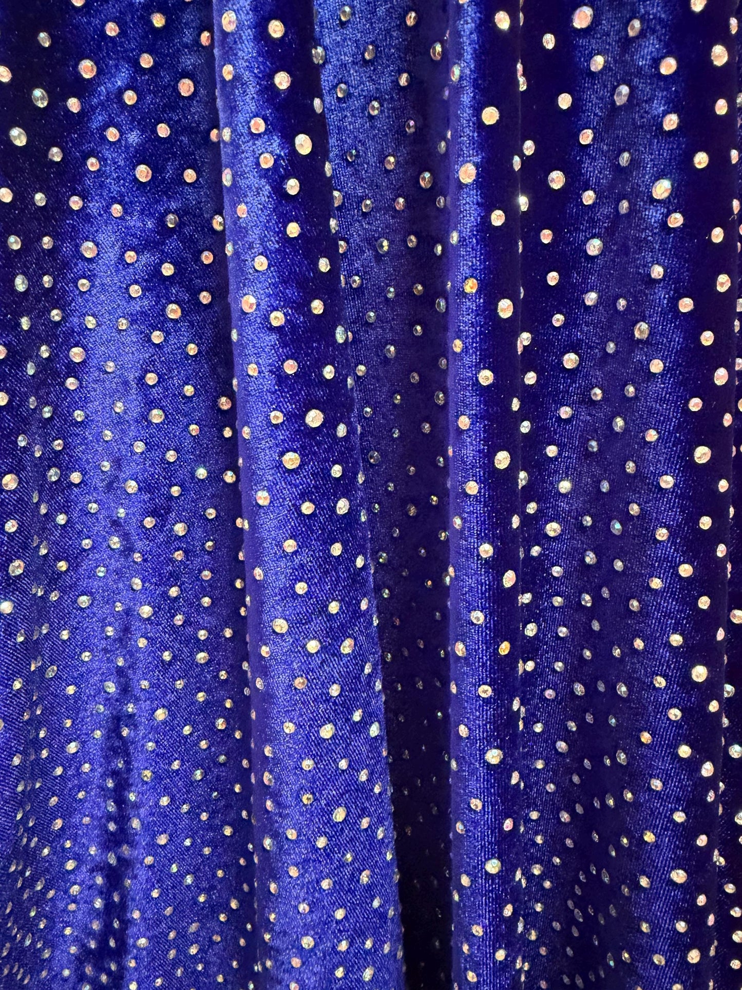 New Rhinestone on stretch velvet 4-way stretch 58/60”sold by the YD. ships Worldwide from Los Angeles CA USA.