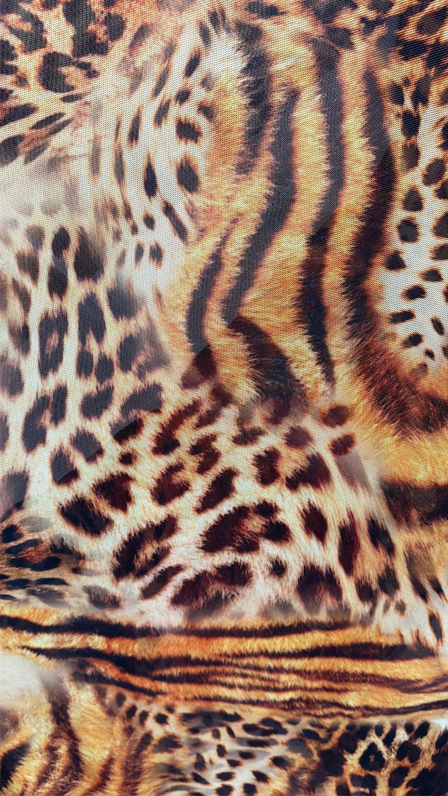 New safari abstract animal design on  power mesh nylon spandex 4-way stretch 58/60”Sold by the YD.Ships worldwide from LA.