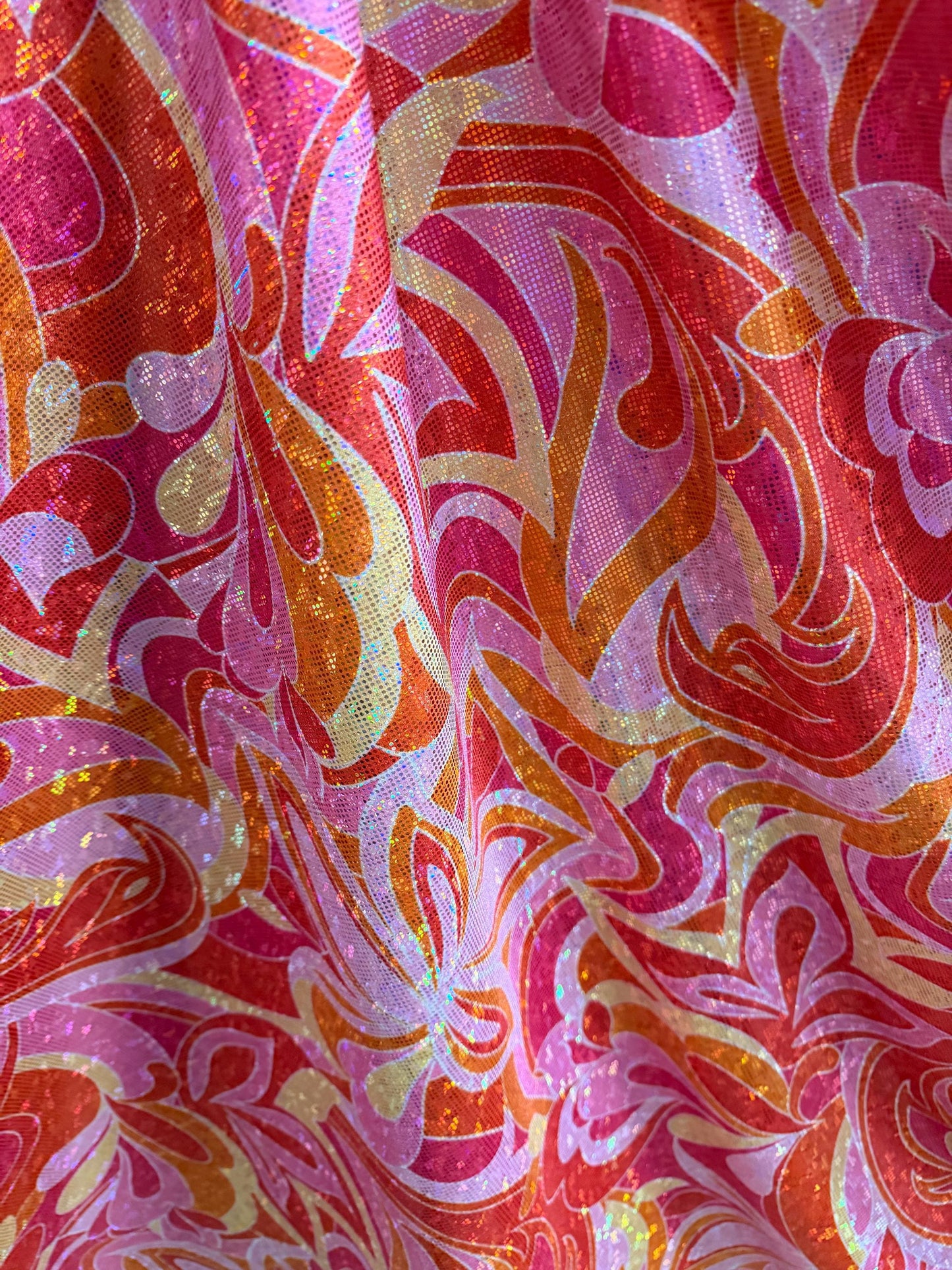 New abstract floral design metallic hologram print on best quality of nylon spandex 4-stretch 59/60”Sold by the YD.Ships worldwide from LA