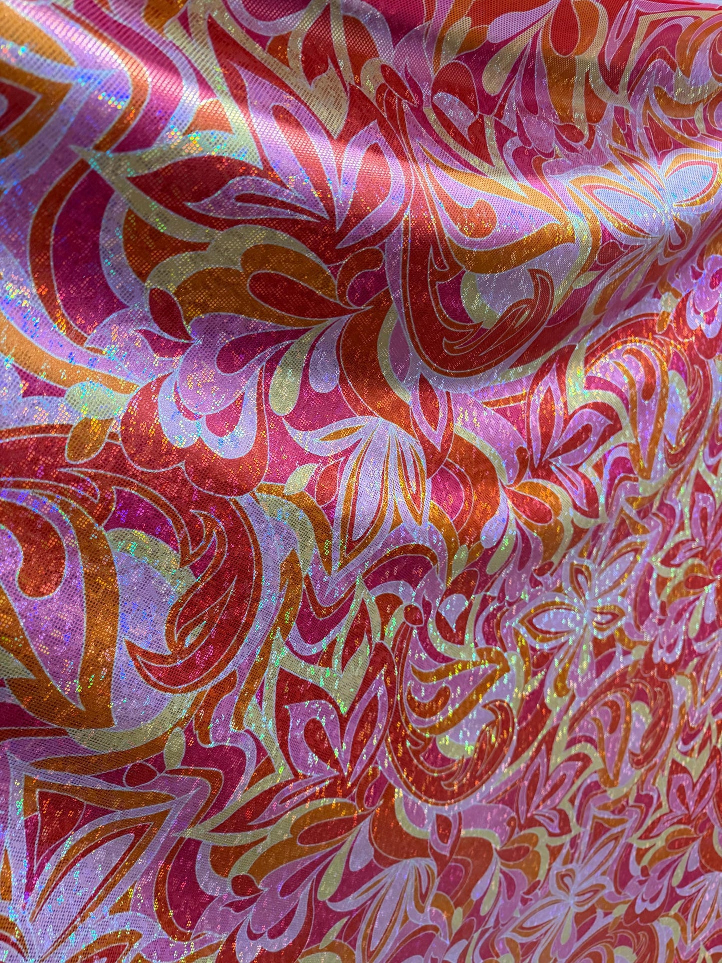 New abstract floral design metallic hologram print on best quality of nylon spandex 4-stretch 59/60”Sold by the YD.Ships worldwide from LA