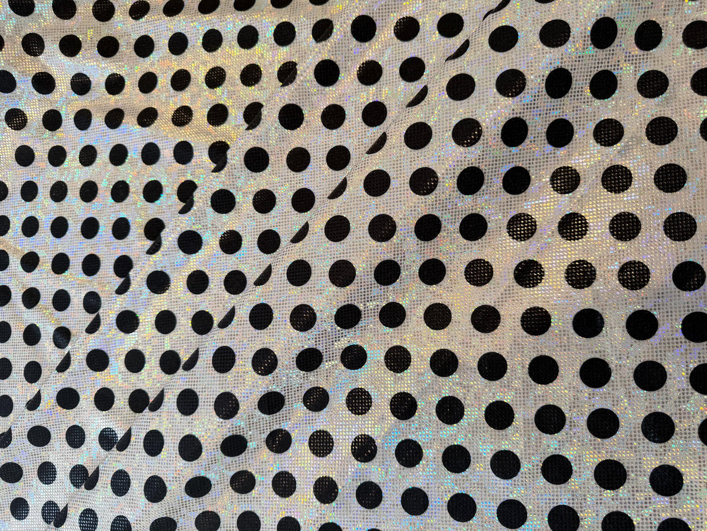 New polka dots pattern design print on shattered glass holograma metallic nylon spandex 4way stretch 58/60”Sold by the YD.