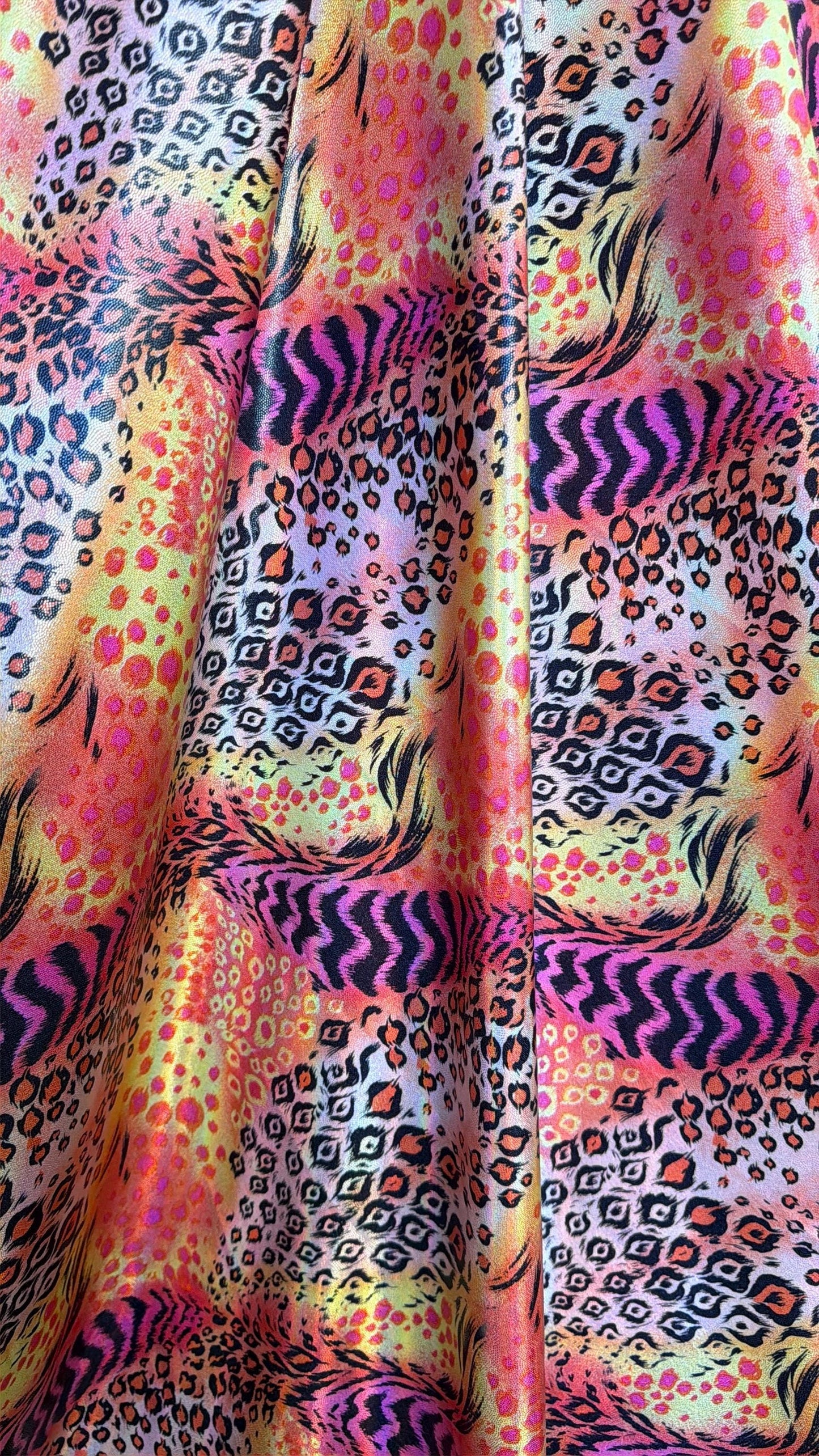 New abstract animal design  lacer hologram metallic nylon spandex 4-way stretch 58/60”sold by the YD.Ships worldwide from Los Angeles Ca.