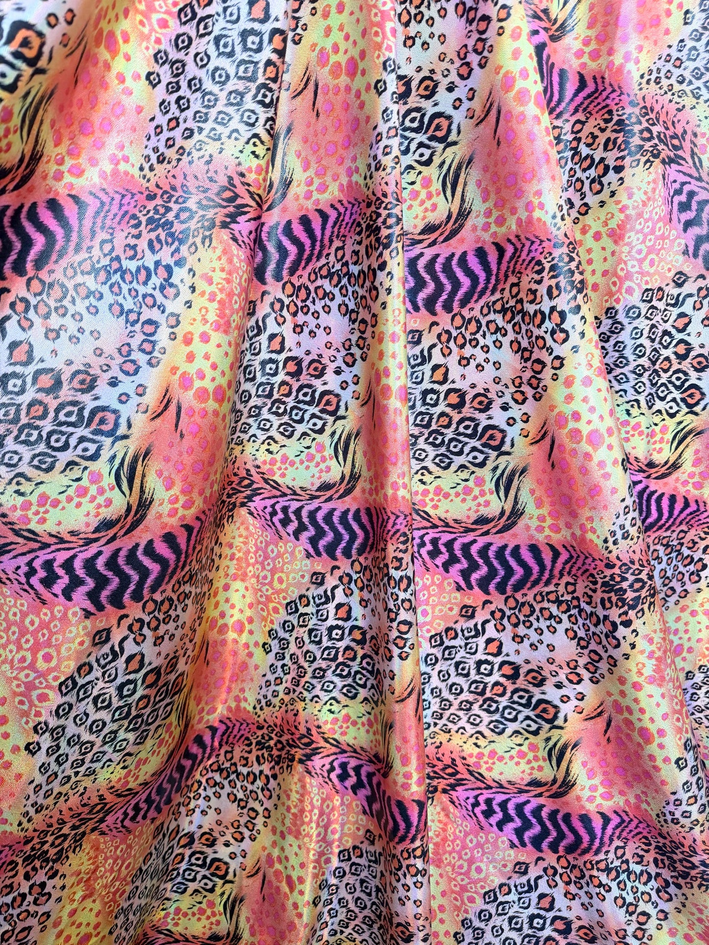 New abstract animal design  lacer hologram metallic nylon spandex 4-way stretch 58/60”sold by the YD.Ships worldwide from Los Angeles Ca.